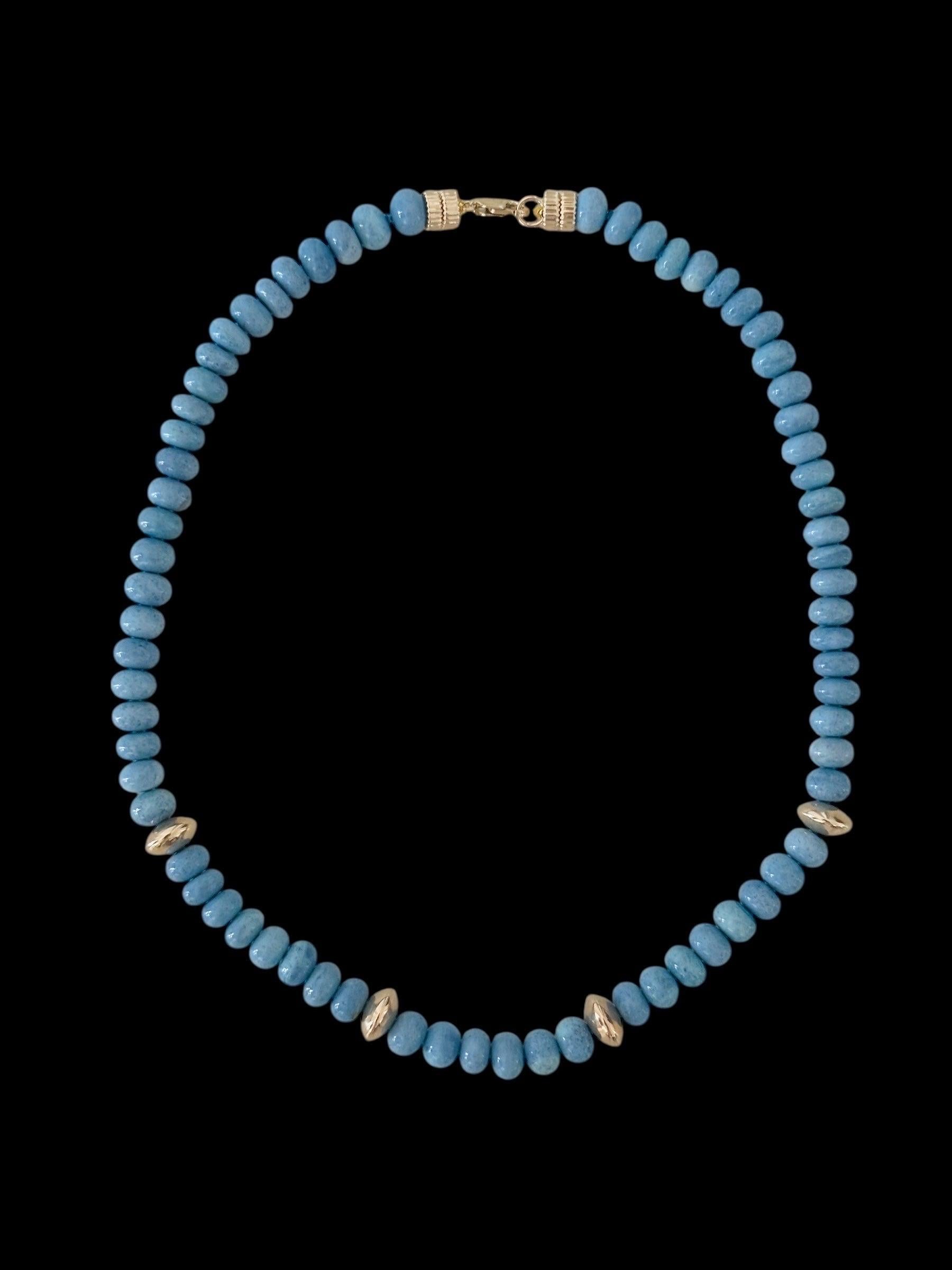 Oregon Blue Opal Necklace

Oregon Blue Opal, 14k Gold

16�” of natural Oregon Blue Opal 8mm rondelle beads with gold beads in the front of necklace as well as at the clasp for a super chic look. 

The blue hue of this gemstone is divine. This