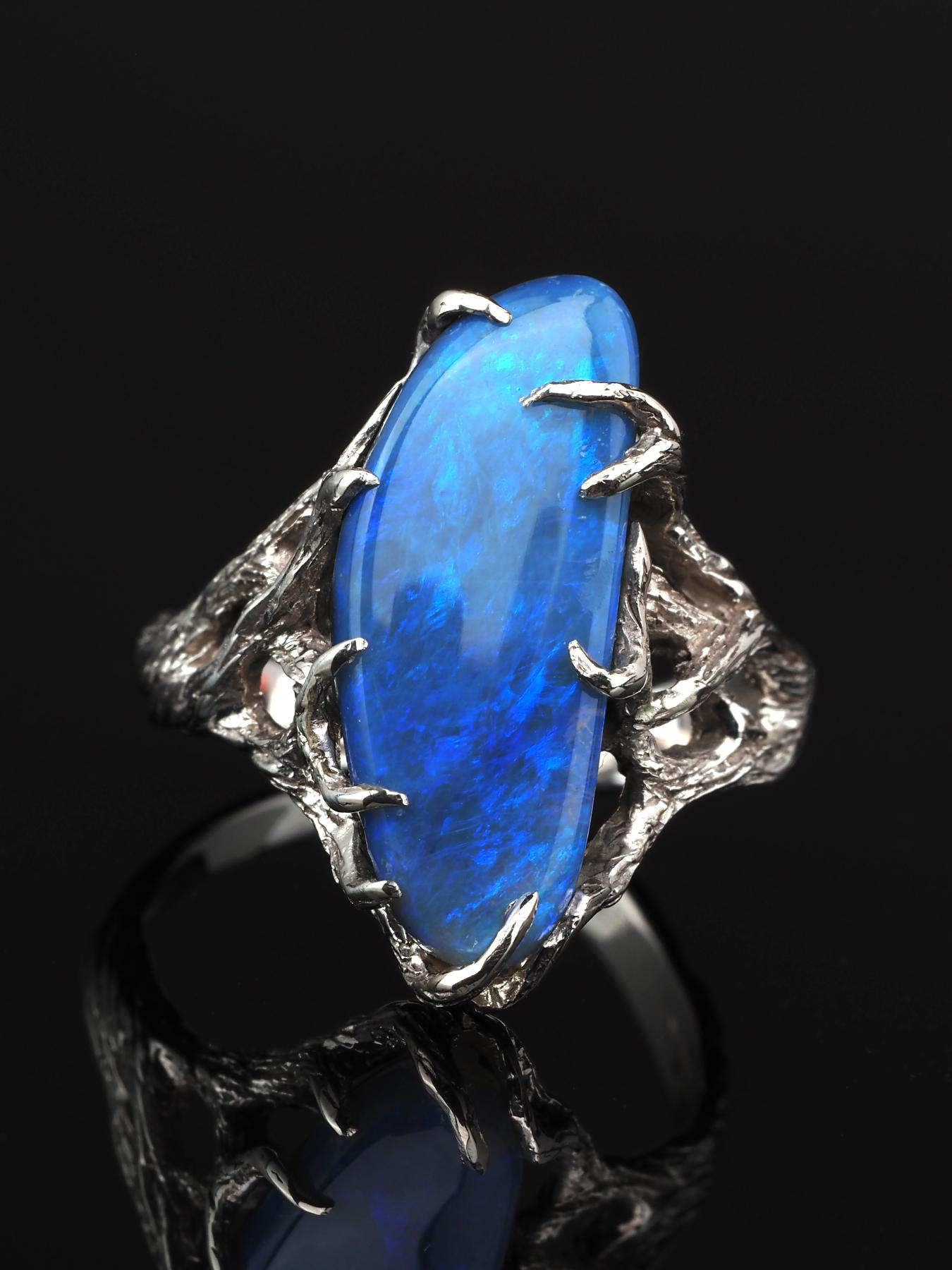 Silver ring with natural Blue Opal with Milky way pattern 
opal origin - Australia
opal measurements - 0.12 x 0.31 x 0.79 in / 3 x 8 x 20 mm
opal weight - 3.85 carat
ring size - 7 1/4 US / 55 EU
ring weight - 3.97 grams

All pictures and videos were