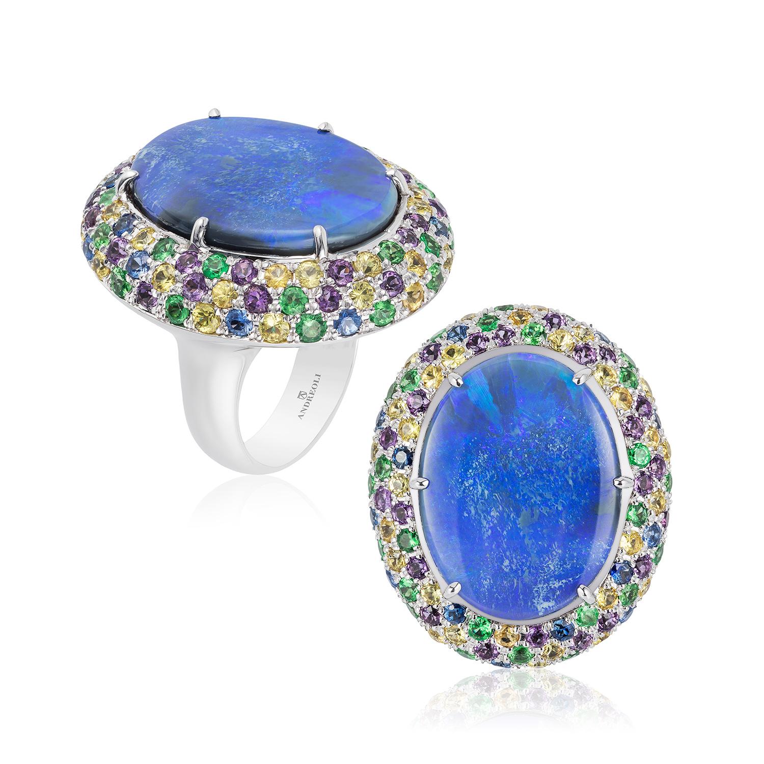 Blue Opal Yellow Blue Sapphire Amethyst Tsavorite Garnet Cocktail Ring 18 Karat. This Andreoli ring features a 17.24 carat blue opal center stone. Accented with full brilliant round cut - 0.74 carats of Blue Sapphires, 1.79 carats of yellow