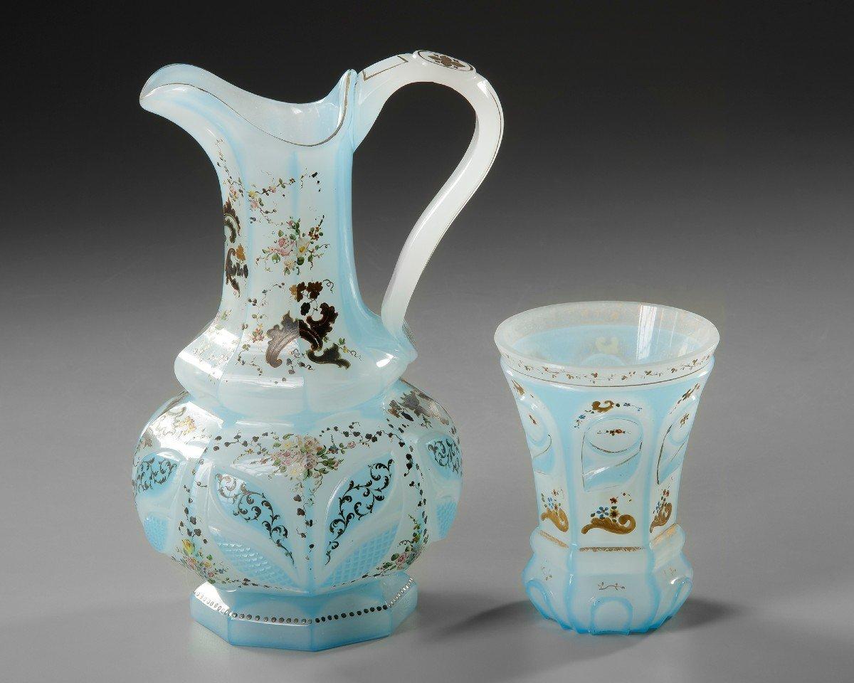Blue opaline ewer and cup, 19th Century
Set of a ewer and its cup
In milky opaline of sky blue colour
Very nice shape
In perfect condition
LATE 19TH CENTURY
Measures: Height: 24.5 cm / 13 cm.