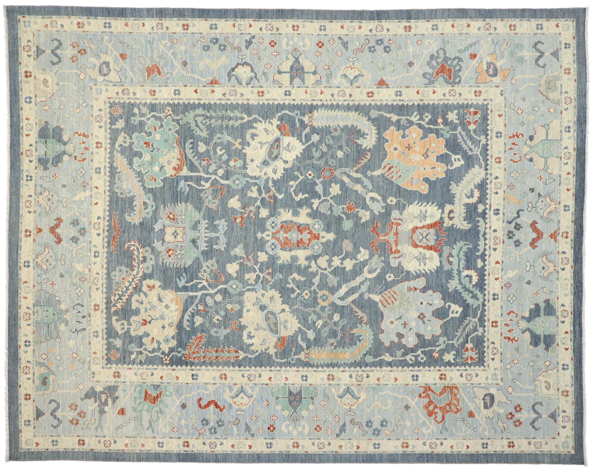 80558 New Colorful Blue Oushak Rug, 11'07 x 14'08. With timeless appeal and a classic color palette, this hand-knotted wool contemporary Oushak style area rug will boost the coziness factor in nearly any space. The large-scale geometric print and