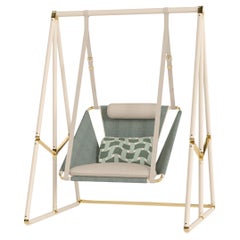 Blue Outdoor Swing with Patterned Pillows