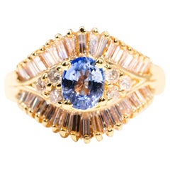 Blue Oval Ceylon Sapphire and Diamond Vintage Cluster 18 Carat Gold Ring