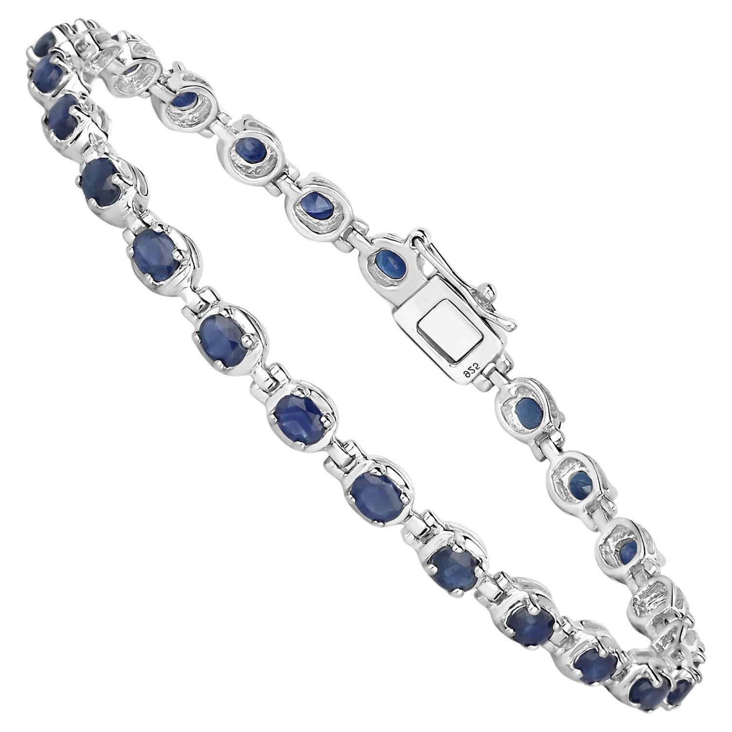 Contemporary Blue Oval Cut Sapphire Tennis Bracelet 5 Carats For Sale