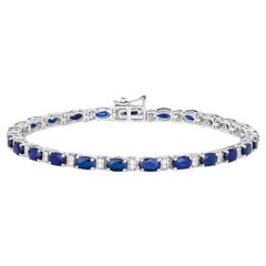 Bracelet à maillons en or blanc 14 carats avec saphirs bleus de taille ovale et diamants 5,75 carats