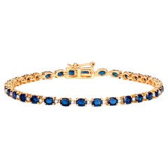 Pulsera de zafiros azules talla oval eslabones de diamantes 6,3 quilates oro amarillo de 10 quilates
