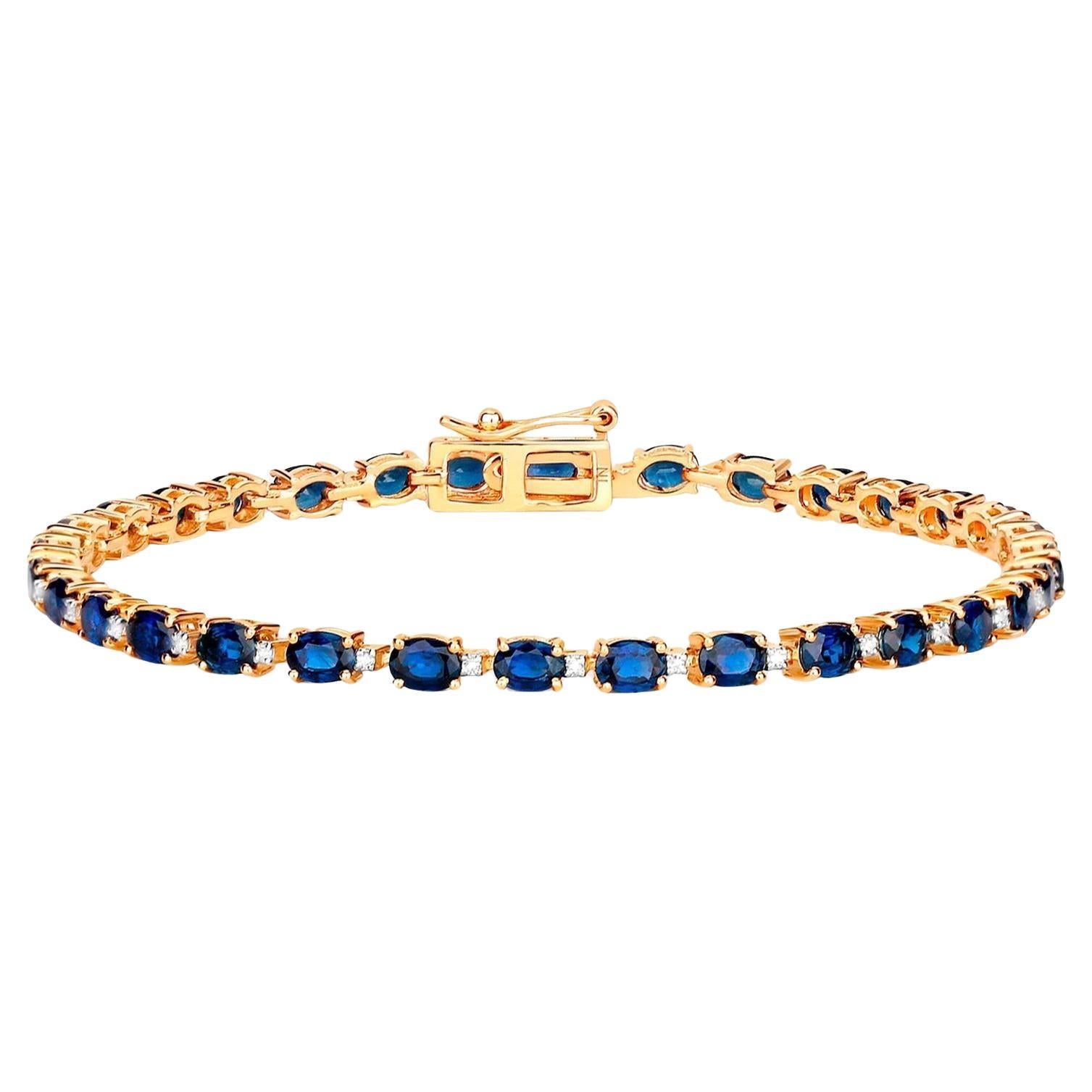 Blaues Armband mit blauen Saphiren im Ovalschliff und Diamantgliedern 6.3 Karat 10K Gelbgold