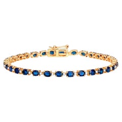 Blue Oval Cut Sapphires Bracelet Diamond Links 6.3 Carats 10K Yellow Gold