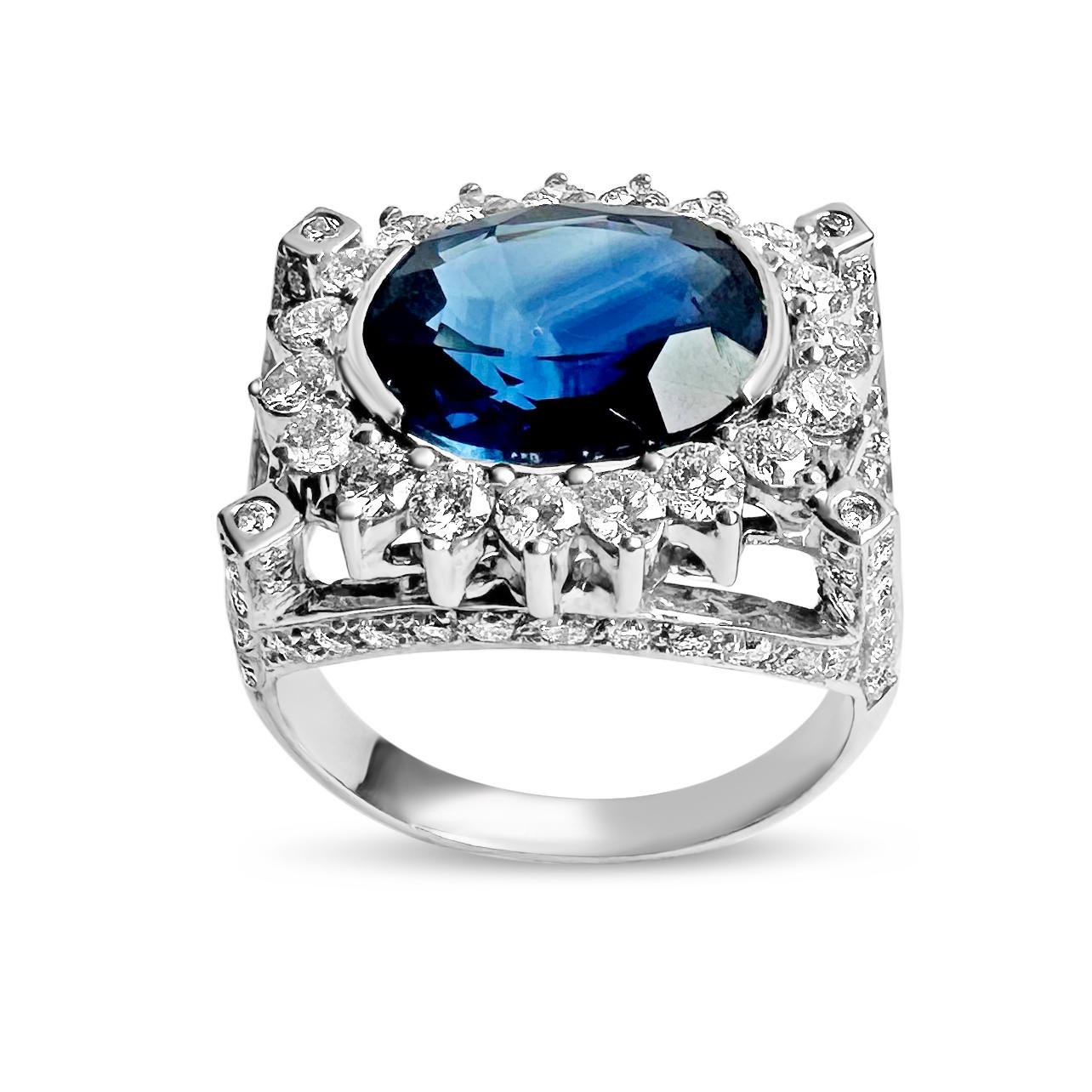 18K White Gold Ring with 125 Round 1.4mm Diamonds 1.74cts G-H VS-SI & 1 Oval 11.3x10.3mm Blue Sapphire 6.15cts

Elevated elegance with the 18K White Gold timeless ring by Manart Gold & Diamond Jewelry. Classic in design and beautifully handcrafted,