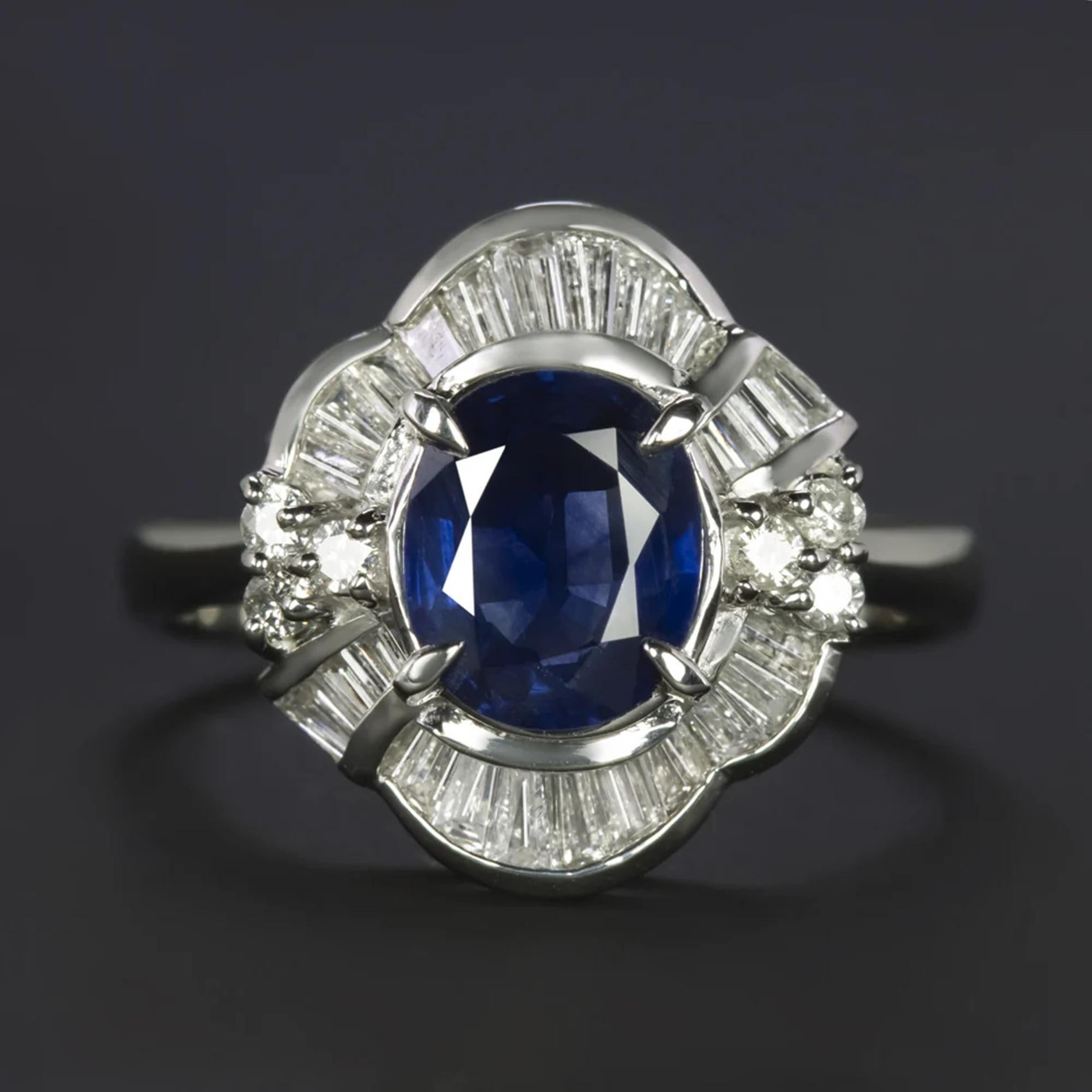 Contemporary Blue Oval Sapphire Scalloped Design Platinum Ring For Sale