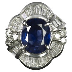 Blue Oval Sapphire Scalloped Design Platinum Ring