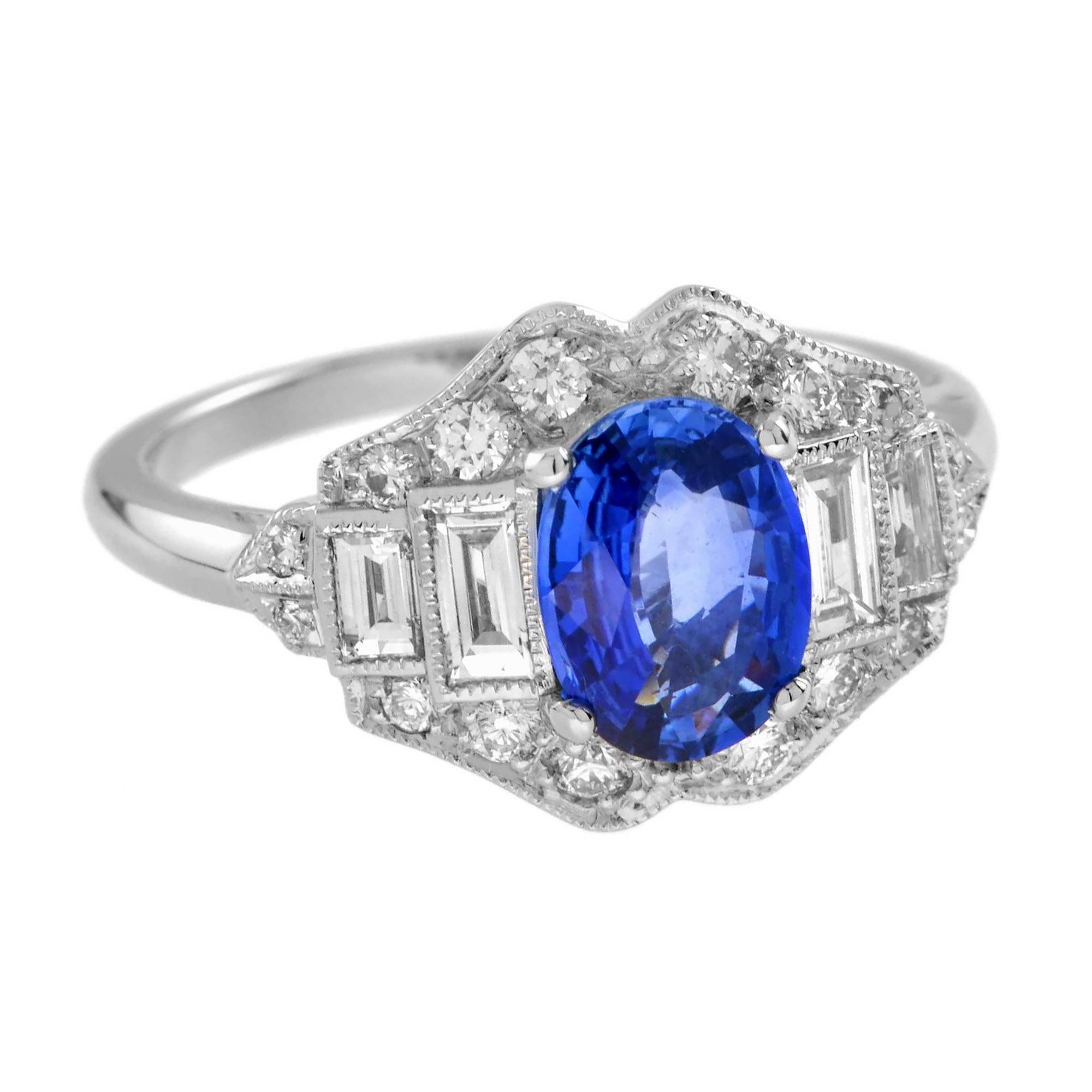 Ceylon blue hues with baguette and brilliant cut diamonds are downward to wrap the finger in a gorgeous designed ring for today’s lifestyles with yesterday’s visual vibe. Art Deco in style, this natural blue oval cut sapphire is prong set.