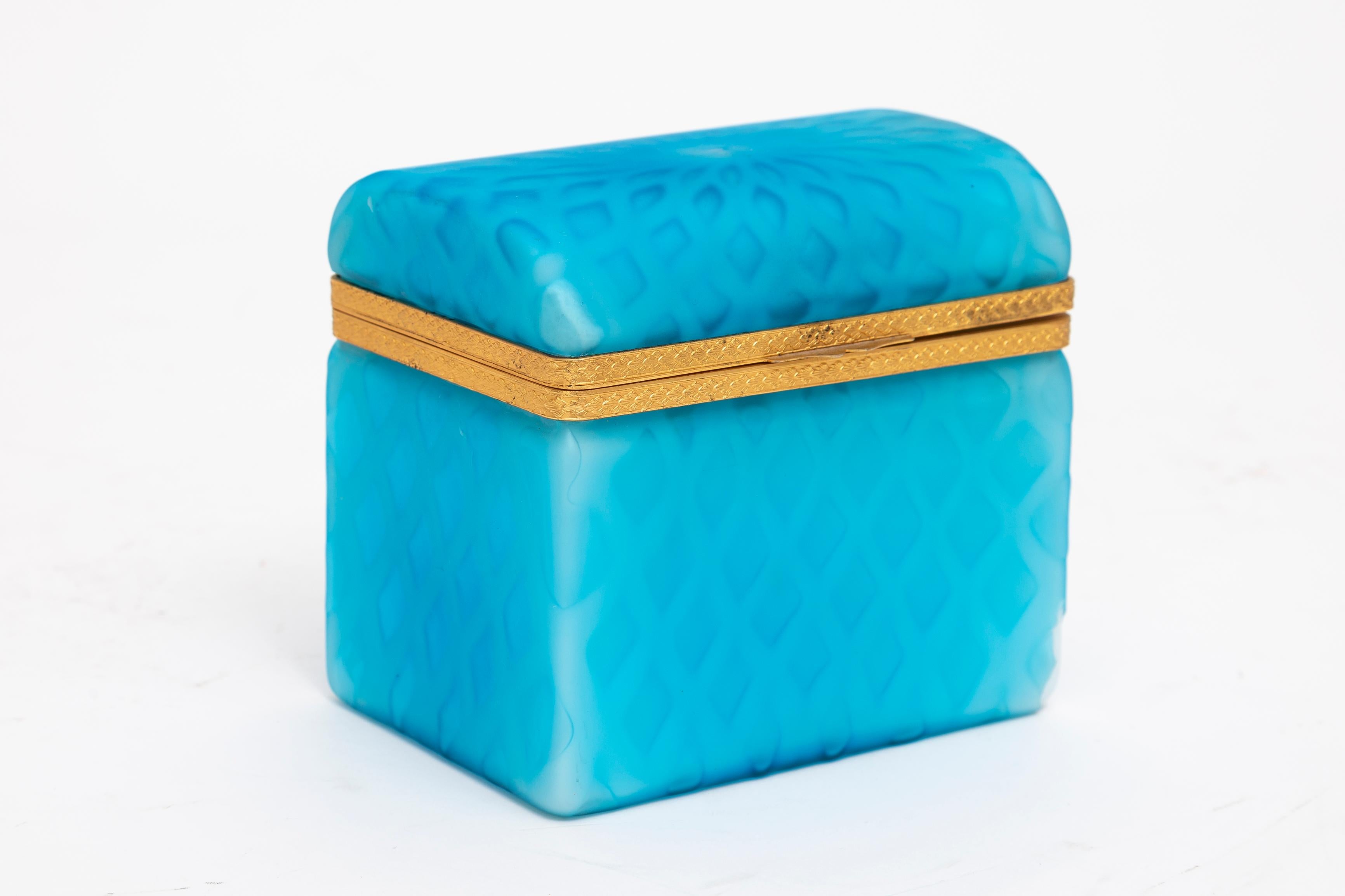 A Beautiful Antique Blue over White Double Overlay Ormolu Mounted Cased Glass Rectangular Box. With a beautiful geometric design cased underneath the top blue layer, which protrudes the design underneath the top blue layer of glass.   The bottom