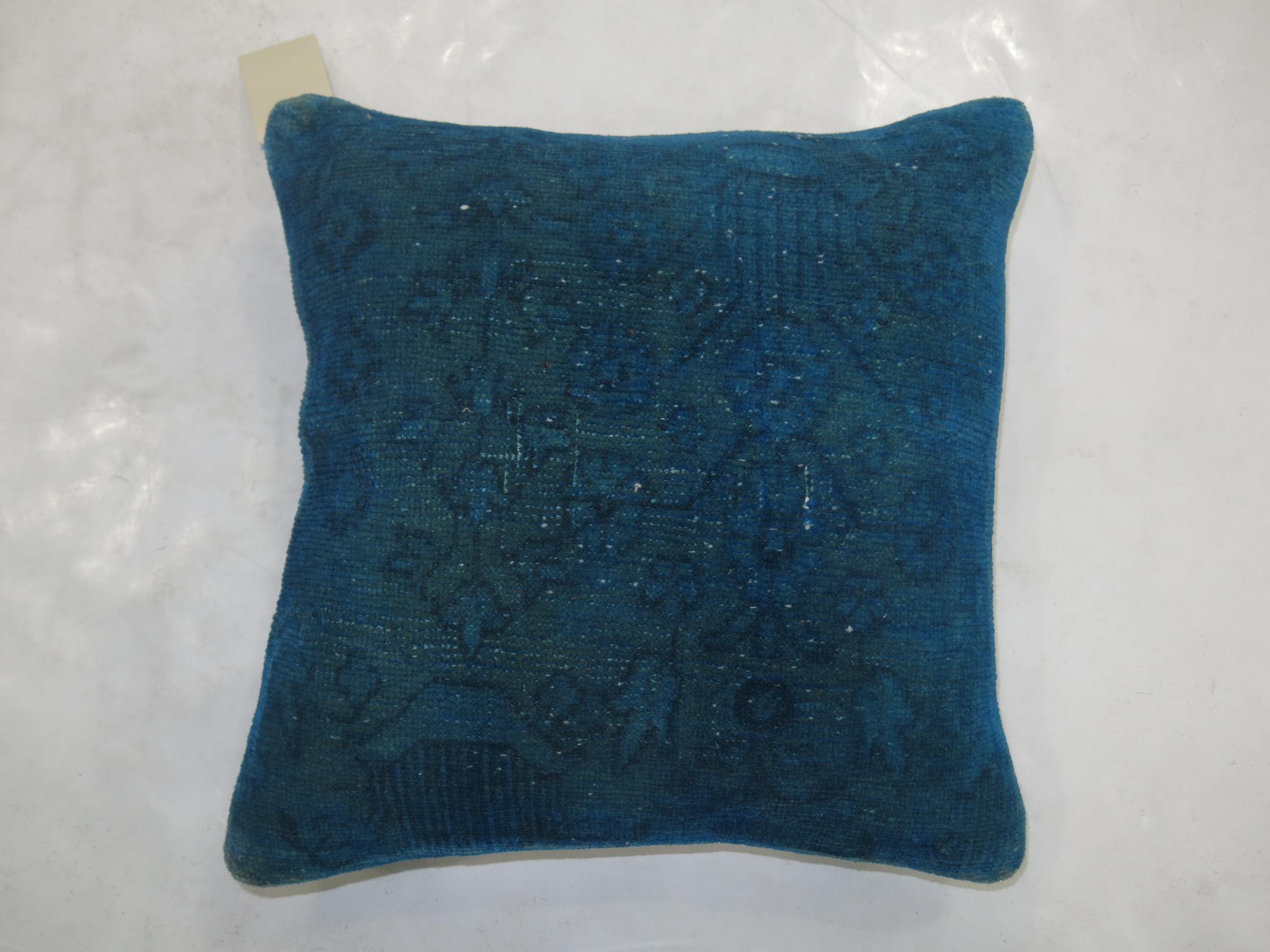 Pillow made from a 20th century Turkish rug with blue cotton back and zipper closure. Its been over-dyed

Measures: 16