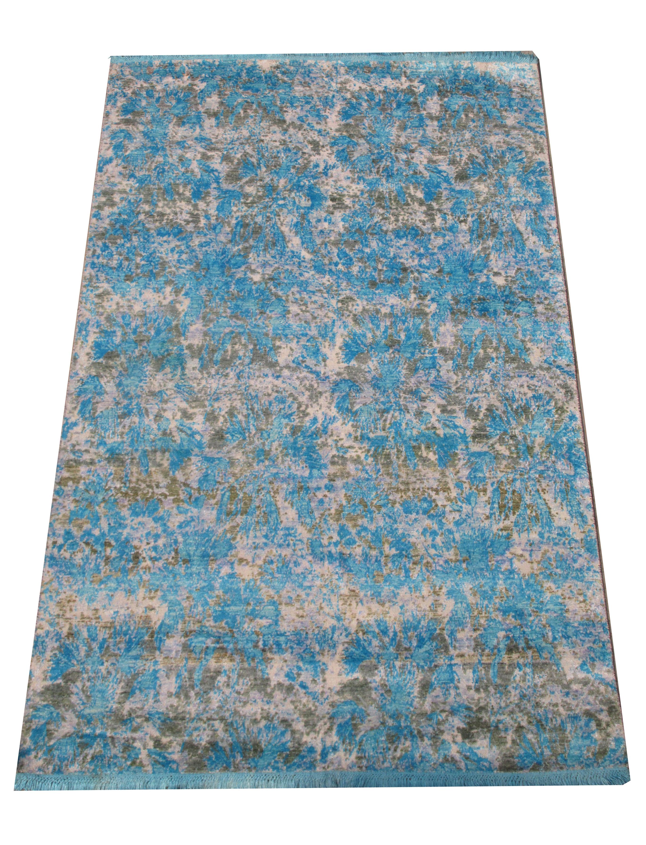 Hand knotted wool & silk pile on a cotton foundation. 

Oxidized design.

Dimensions: 7'10