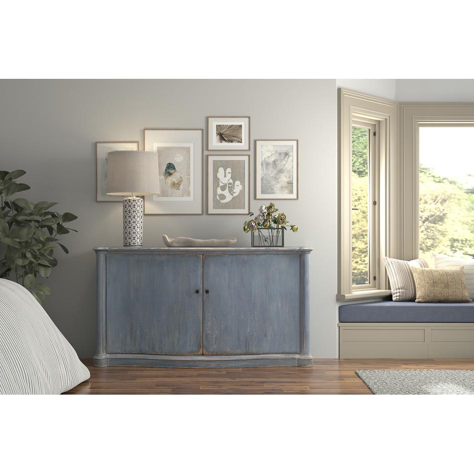 Crafted from reclaimed pine, this exquisite piece showcases a graceful bowfront design, accentuated by elegant column-form and turret corners. The hand-applied Robin's Egg Blue finish exudes a refined, antique-inspired aesthetic, adding a touch of