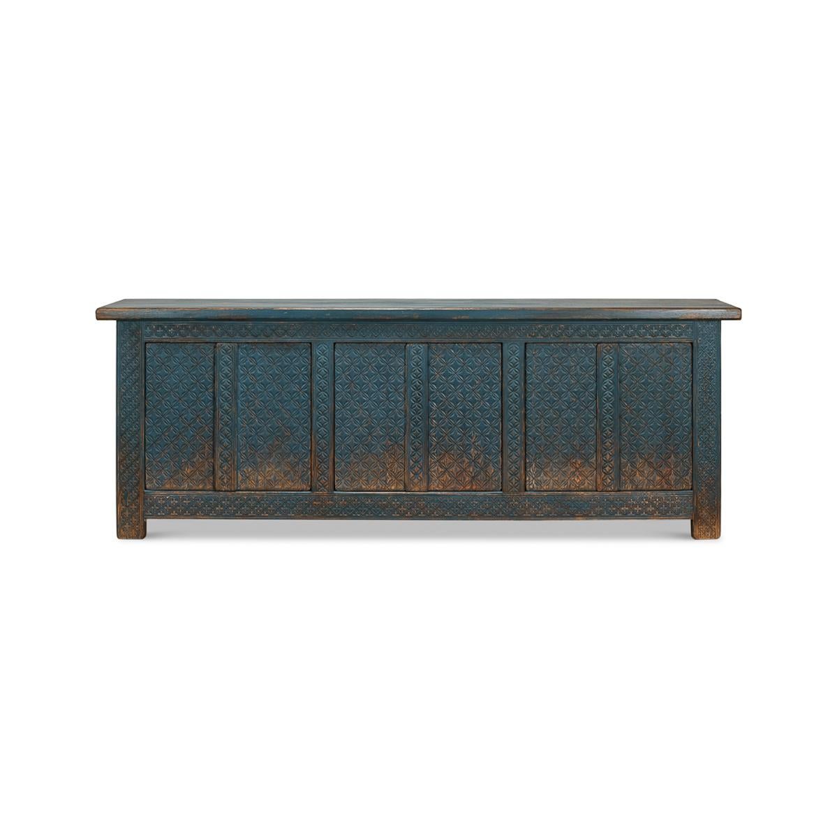 Carved reclaimed pine in a dark blue distressed and antiqued finish. Six cabinet doors open to reveal a painted interior with removable shelves.

Dimensions: 98