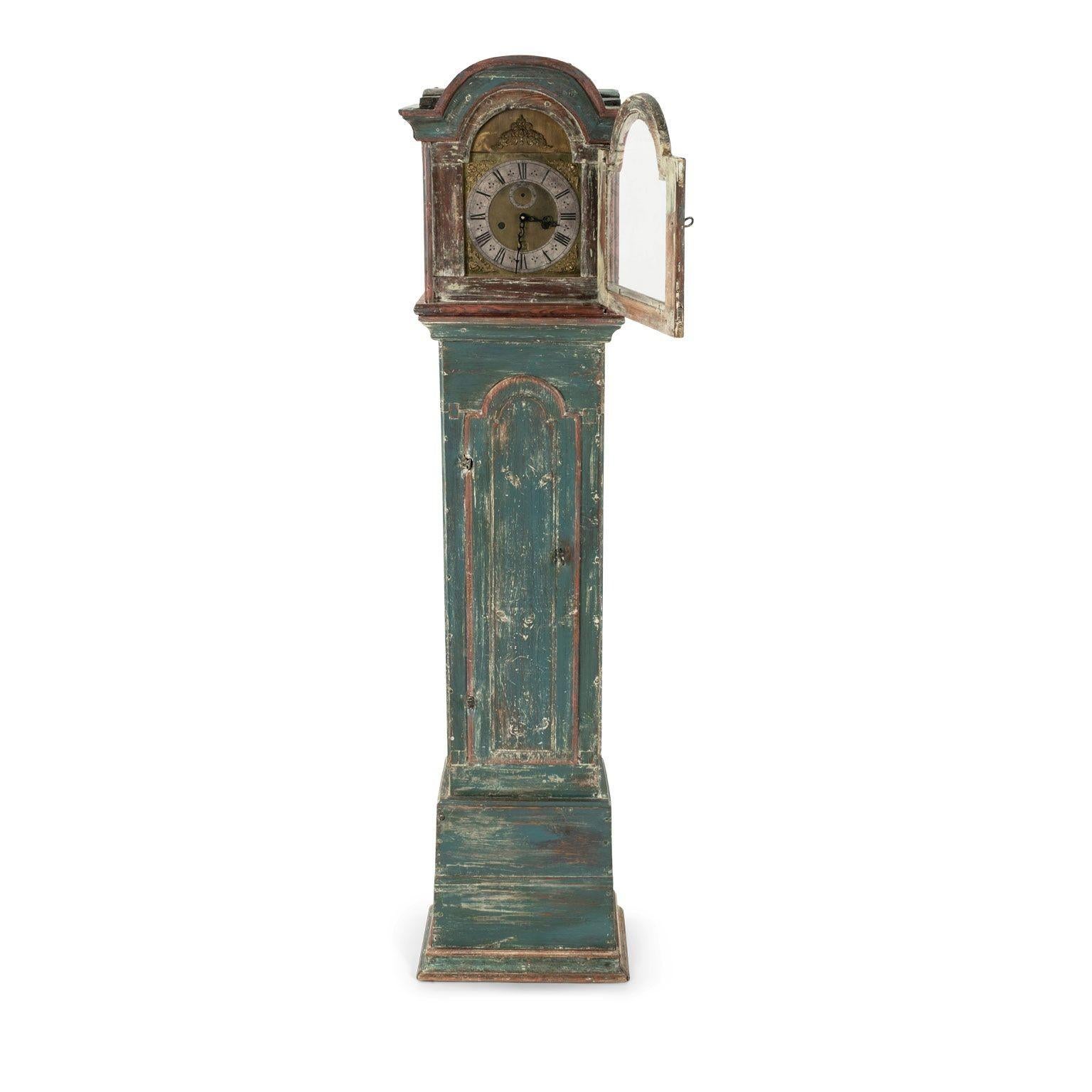 Blue-painted Swedish tall case clock, circa 1775. Swedish Gustavian tall case clock dating to late 18th century. At some point in the past, clock was separated from its original works and face. Current face is 17th century English (although it would