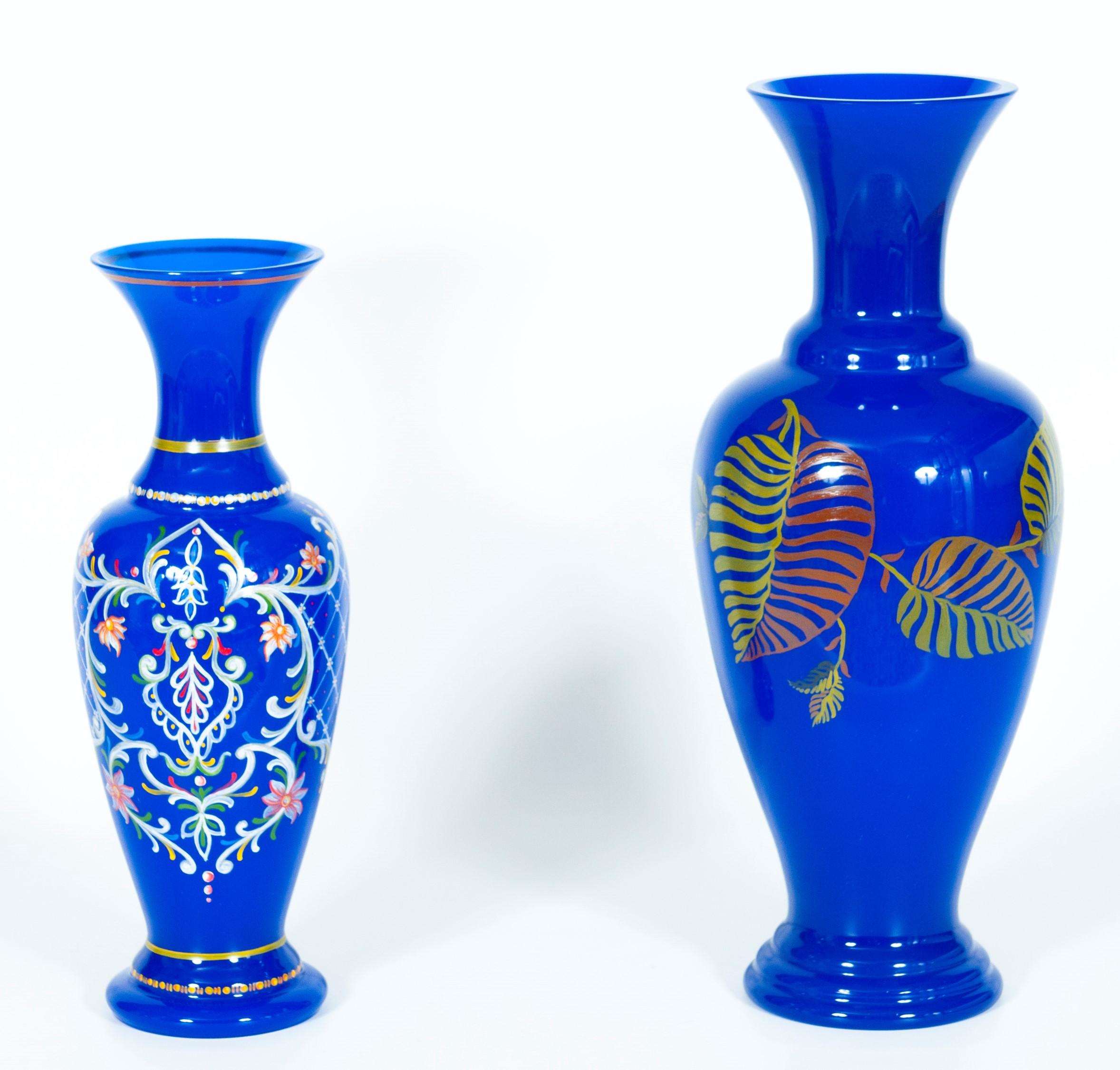 Pair of blue Murano glass vases with art painting, Giovanni Dalla Fina, 1980s, Italy.
This amazing pair of Italian vases will steal the scene, thanks to their intense blue color, their refined shapes, their high-quality details, and their beautiful