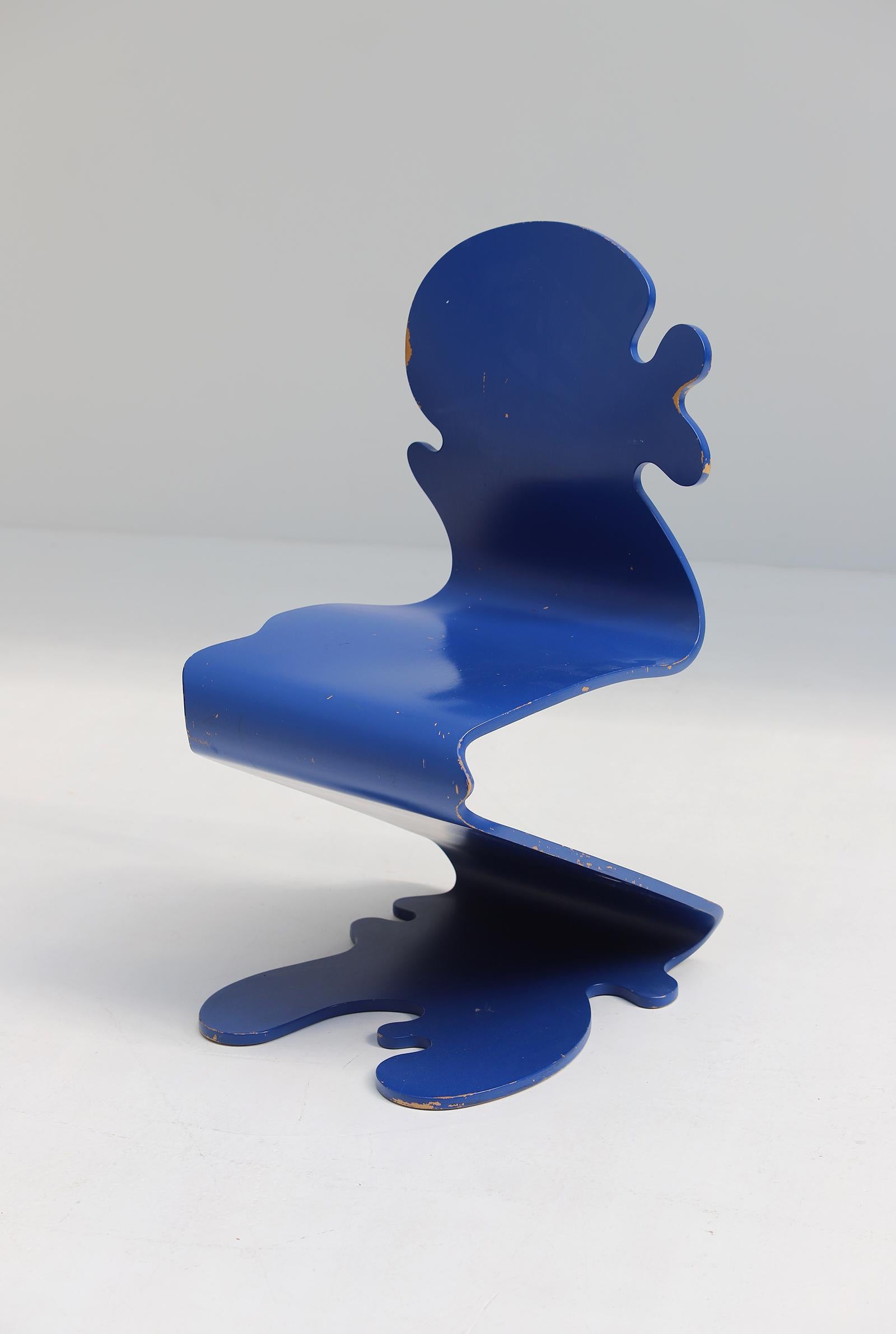 Danish designer Verner Panton is well known for his color- and playful designs. This cantilevered side chair, called pantonic 5010 Chair, is part of a 3-parts collection. (pantonic 5000 - pantonic 5020) The chair is designed in 1992 for studio HAG,