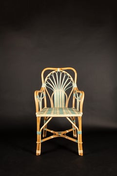 Blue Peacock Rattan Arm Chair by Creel and Gow
