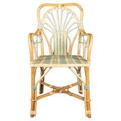 Blue Peacock Rattan Arm Chair by Creel and Gow