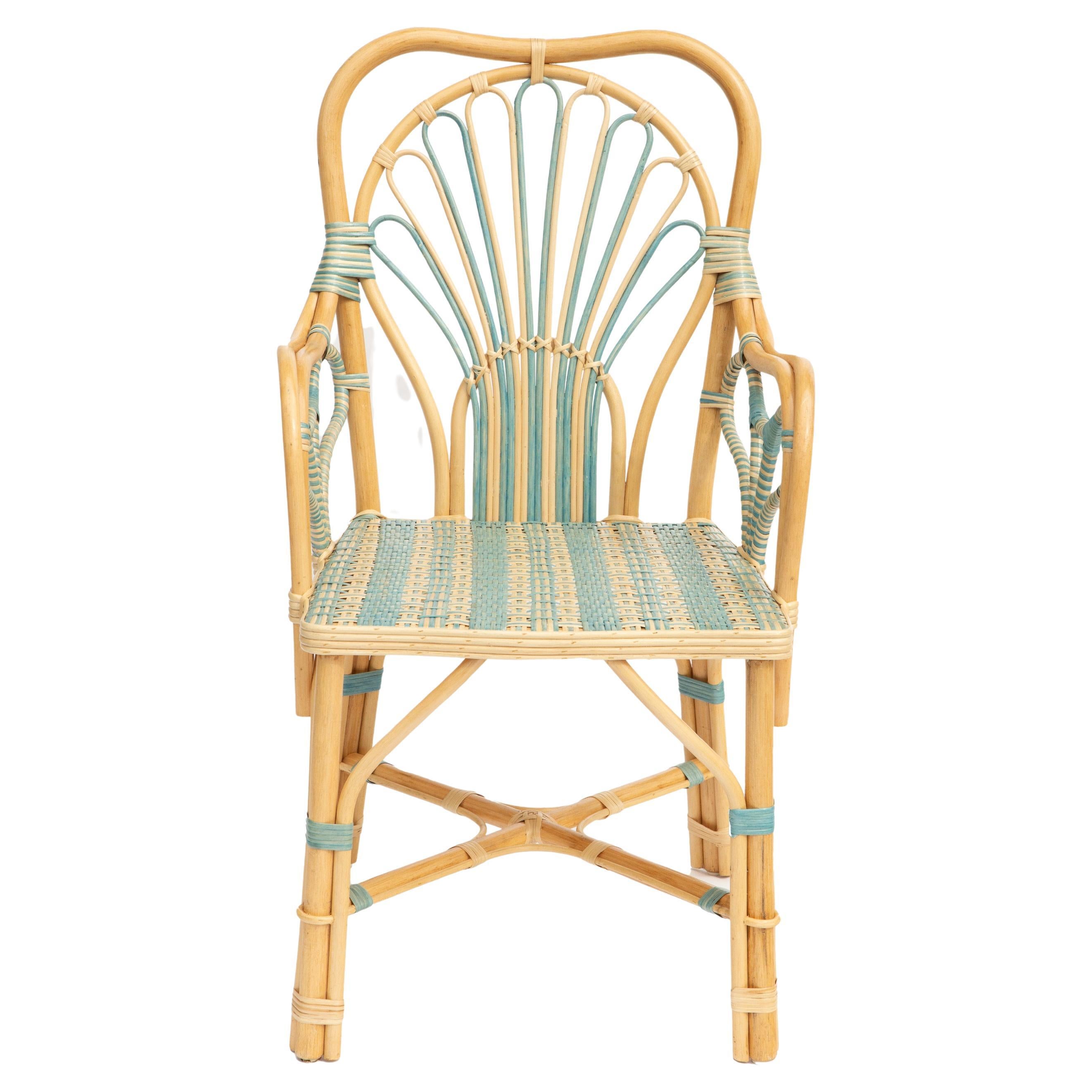 Blue Peacock Rattan Arm Chair by Creel and Gow