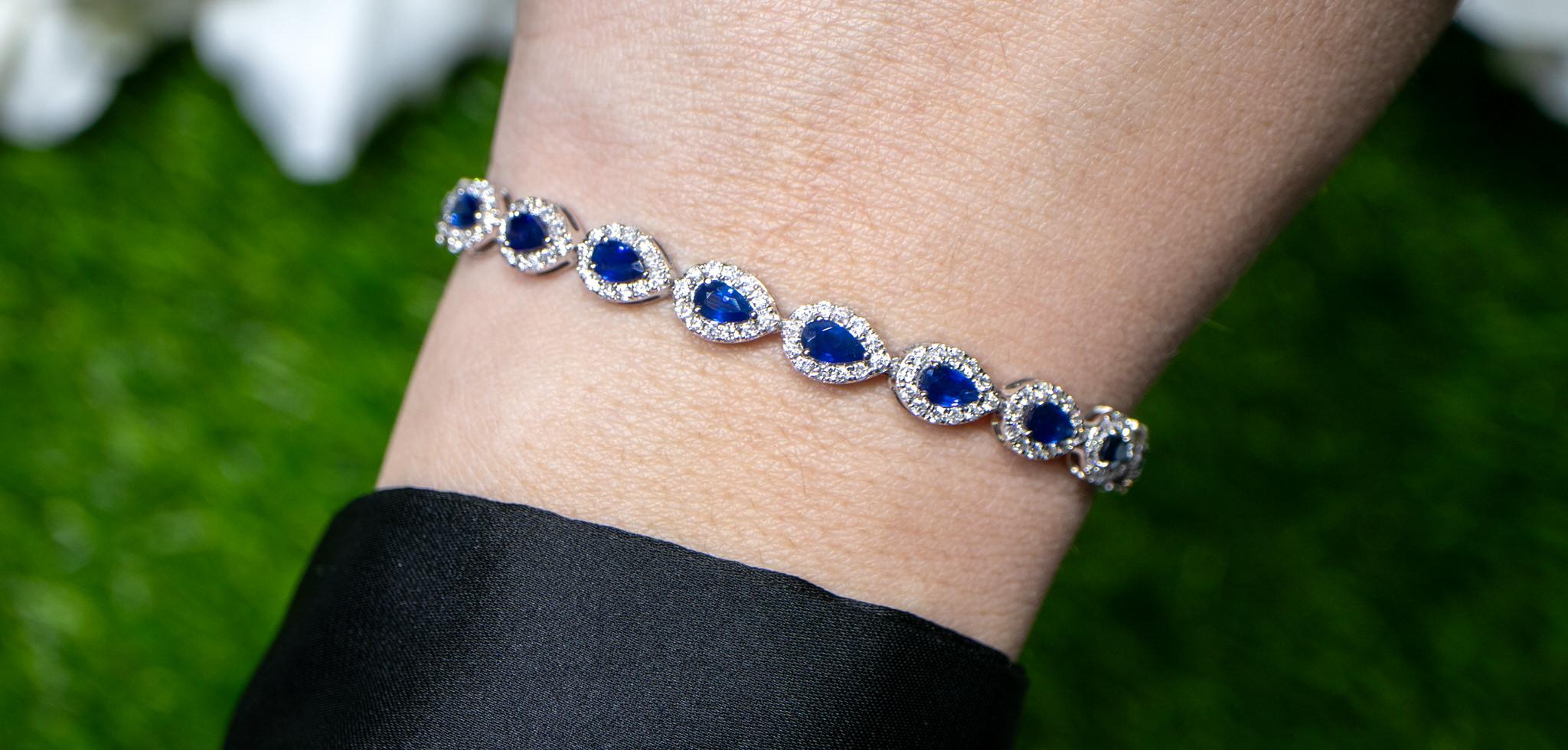 It comes with the Gemological Appraisal by GIA GG/AJP
All Gemstones are Natural
Blue Sapphires = 4.44 Carats
Diamonds = 2.50 Carats
Metal: 18K White Gold
Length: 7 Inches
Width: 0.22 Inches