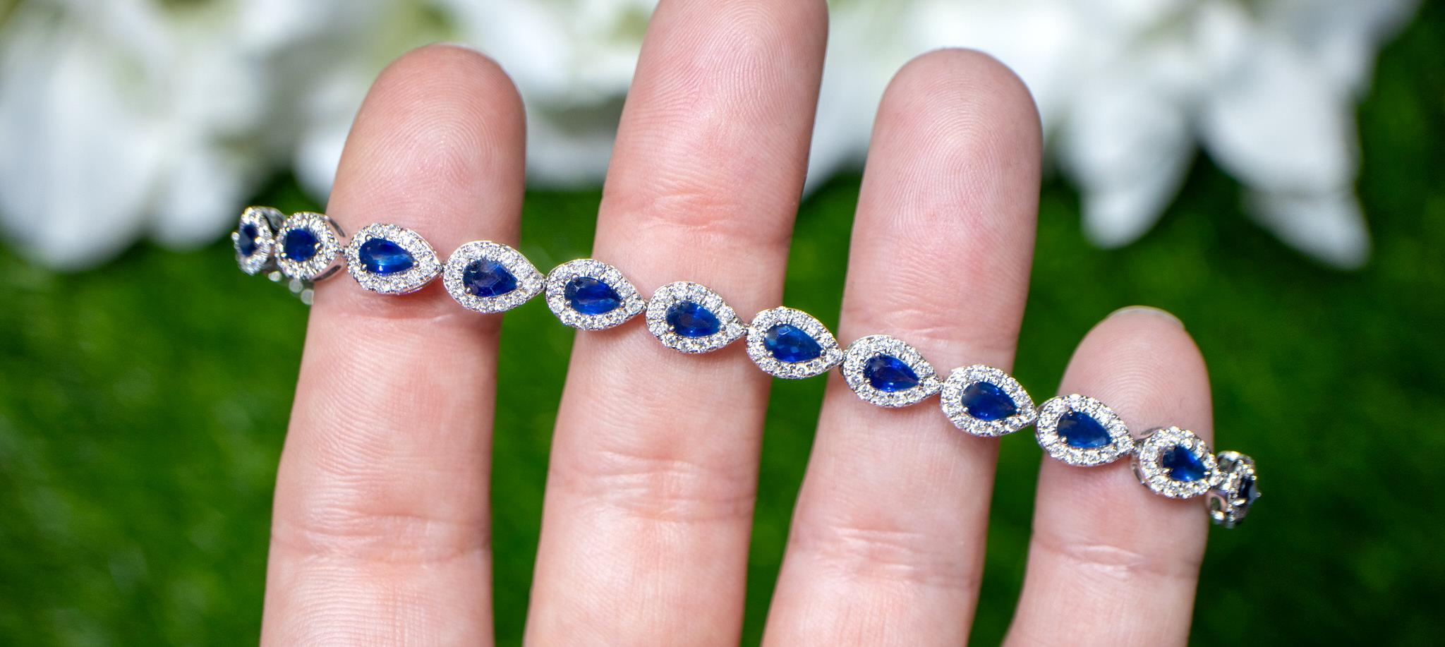 Modern Blue Pear Cut Sapphire Bracelet Diamond Halo 6.94 Carats 18K Gold For Sale
