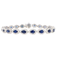 Blue Pear Cut Sapphire Bracelet Diamond Halo 6.94 Carats 18K Gold