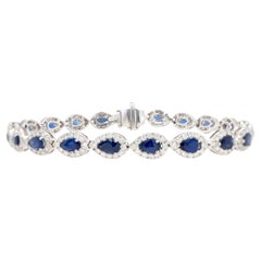 Bracciale con zaffiro blu taglio pera Diamante aureolato 6,94 carati Oro 18 carati