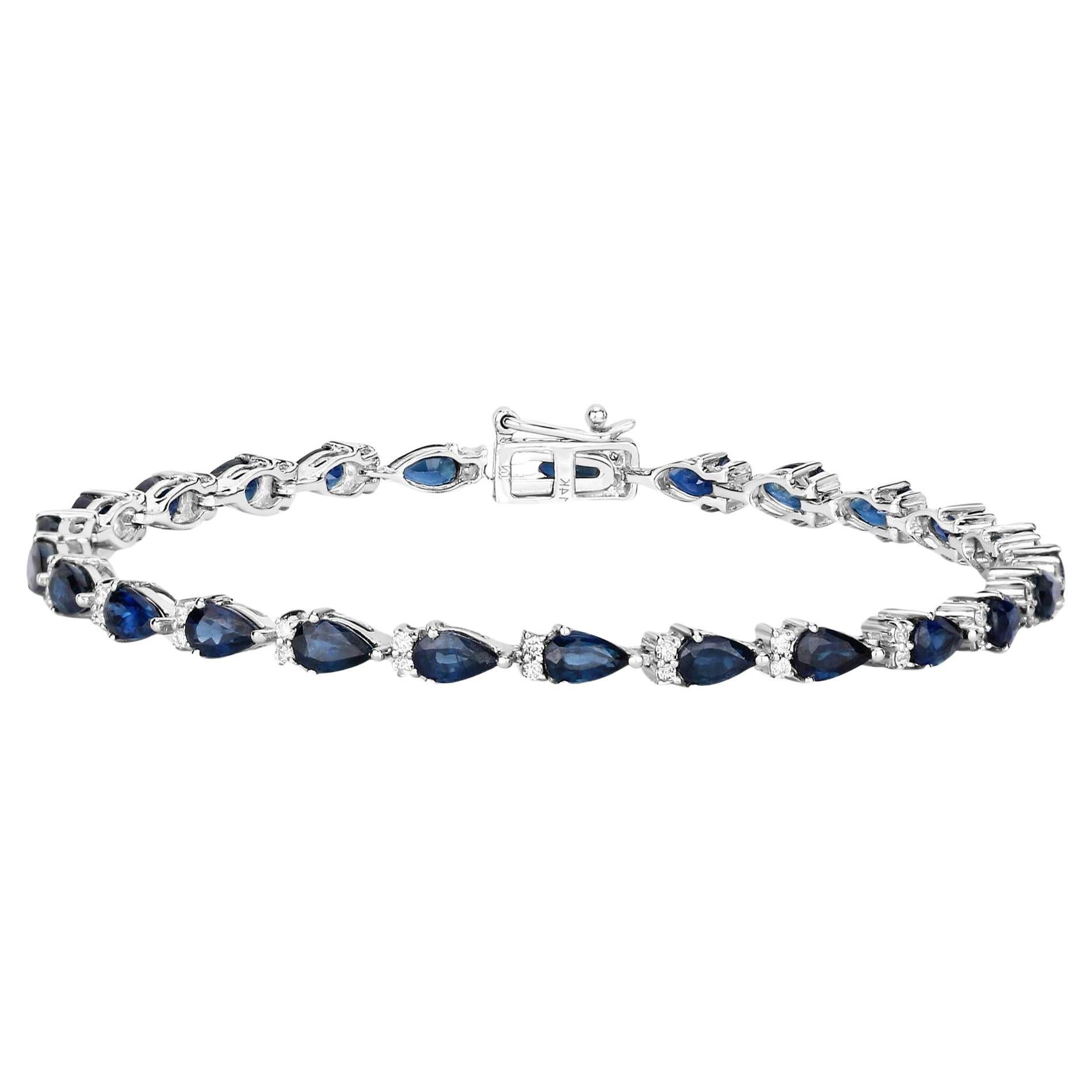 Bracelet tennis à maillons en or blanc 14 carats avec saphir bleu taille poire et diamants 5,40 carats