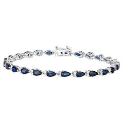 Bracelet tennis à maillons en or blanc 14 carats avec saphir bleu taille poire et diamants 5,40 carats