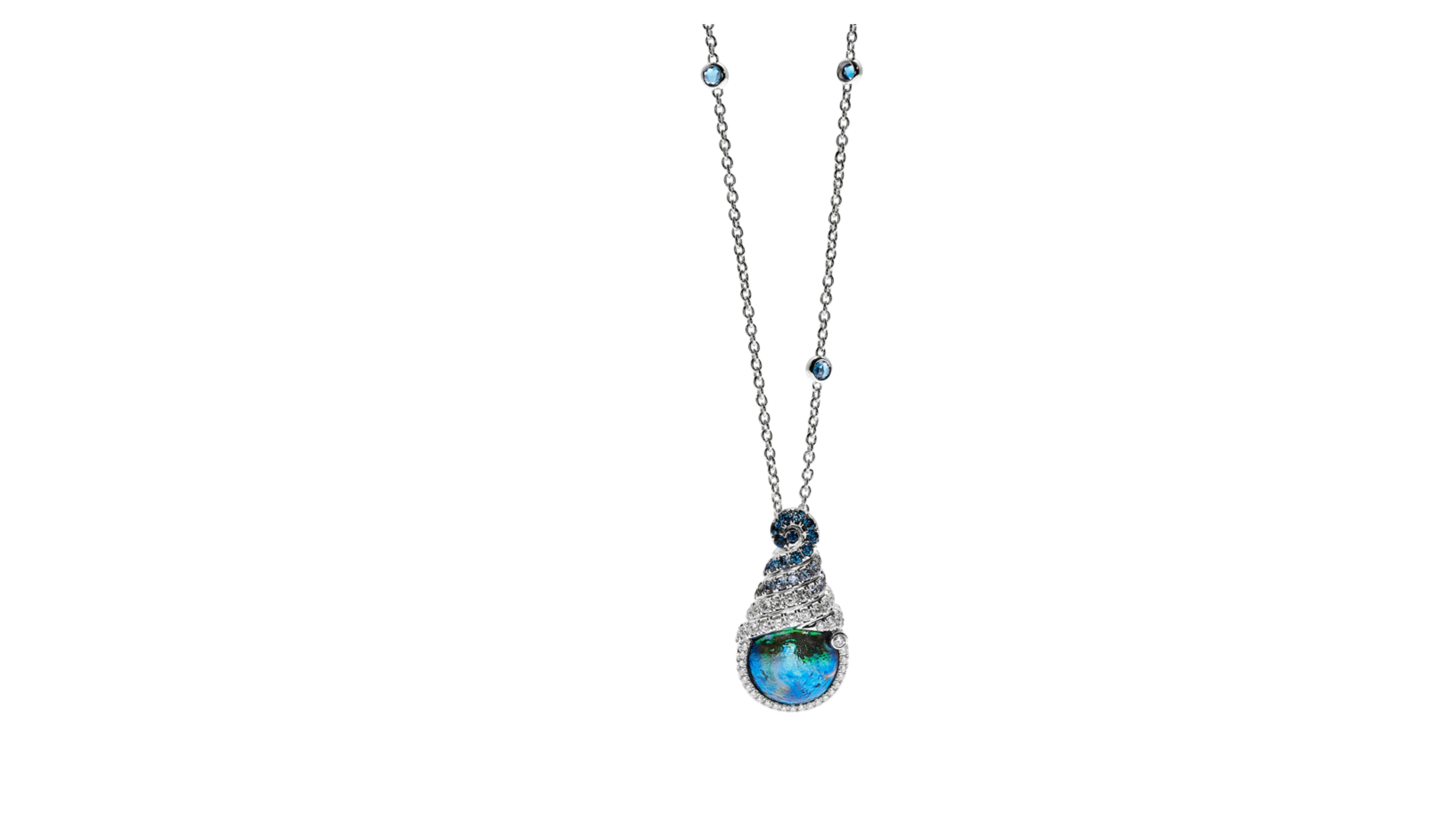 
This is  a very unique Blue Pearl  Necklace with Sapphire stones and 44  diamonds  and 21 sapphires on the pendant with ones on the chain. 
Notice the flahes of green in the blue pearl 

Blue Pearl Types: Naturally colored blue pearls are a special
