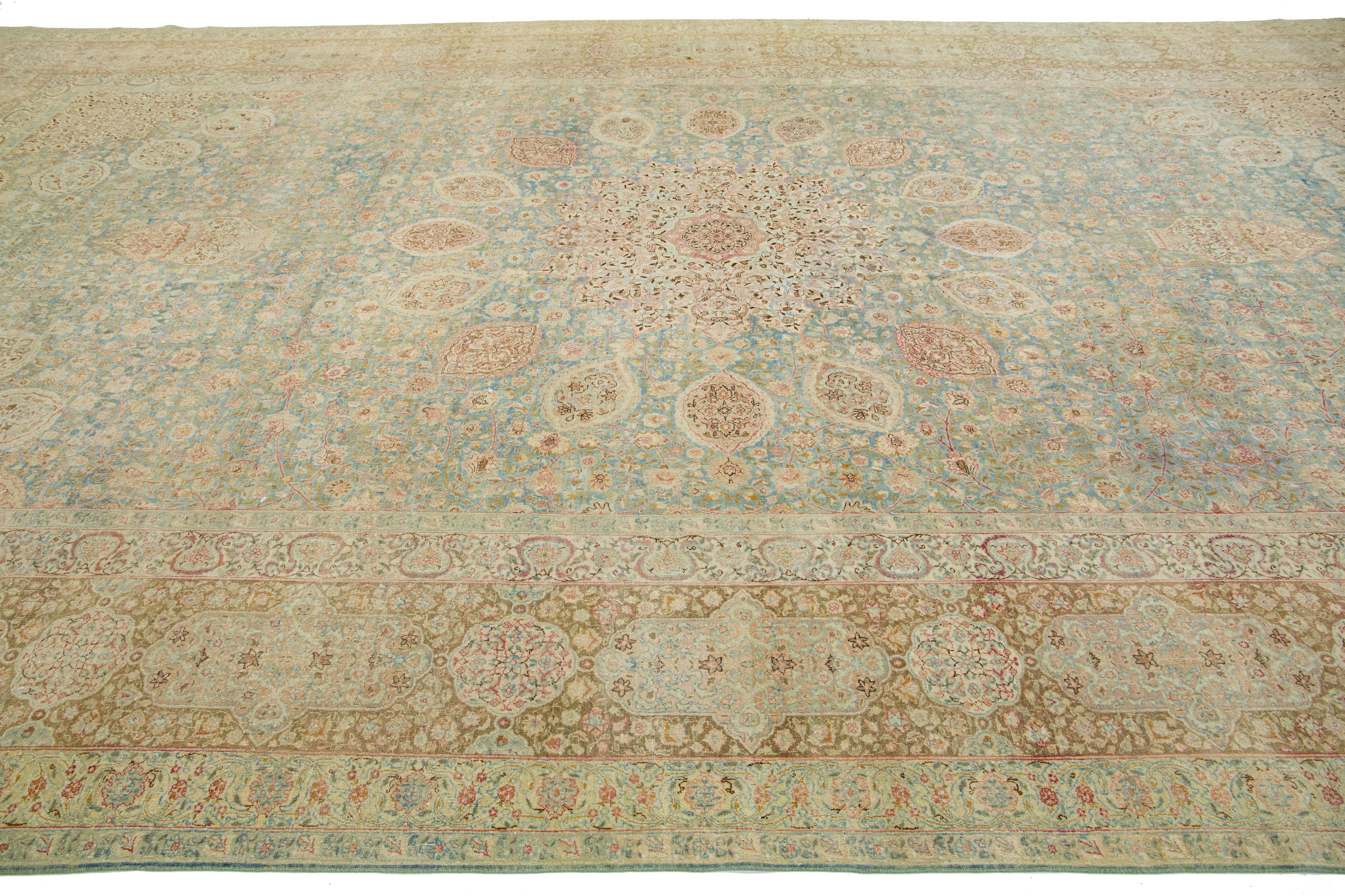 Hand-Knotted Blue Persian Antique Kerman Handmade Wool Rug With Rosette Design For Sale