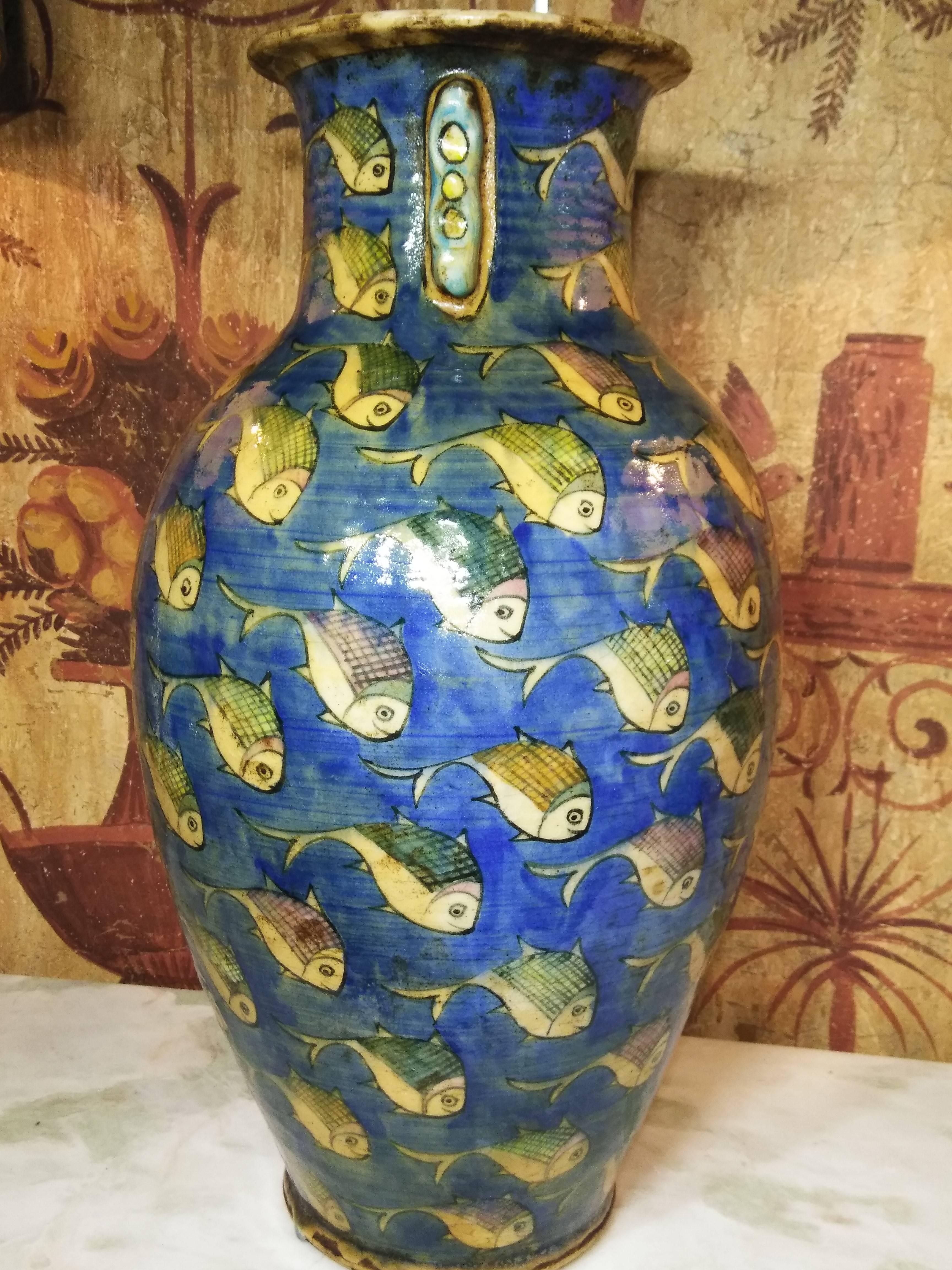 Beautiful vintage blue Persian ceramic vase hand-painted and glazed with colorful fish motif surrounding it, great decorative piece of art for any room.