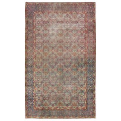Blauer persischer Tabriz Antiker Wollteppich mit floralem Allover-Motiv aus den 1900er Jahren