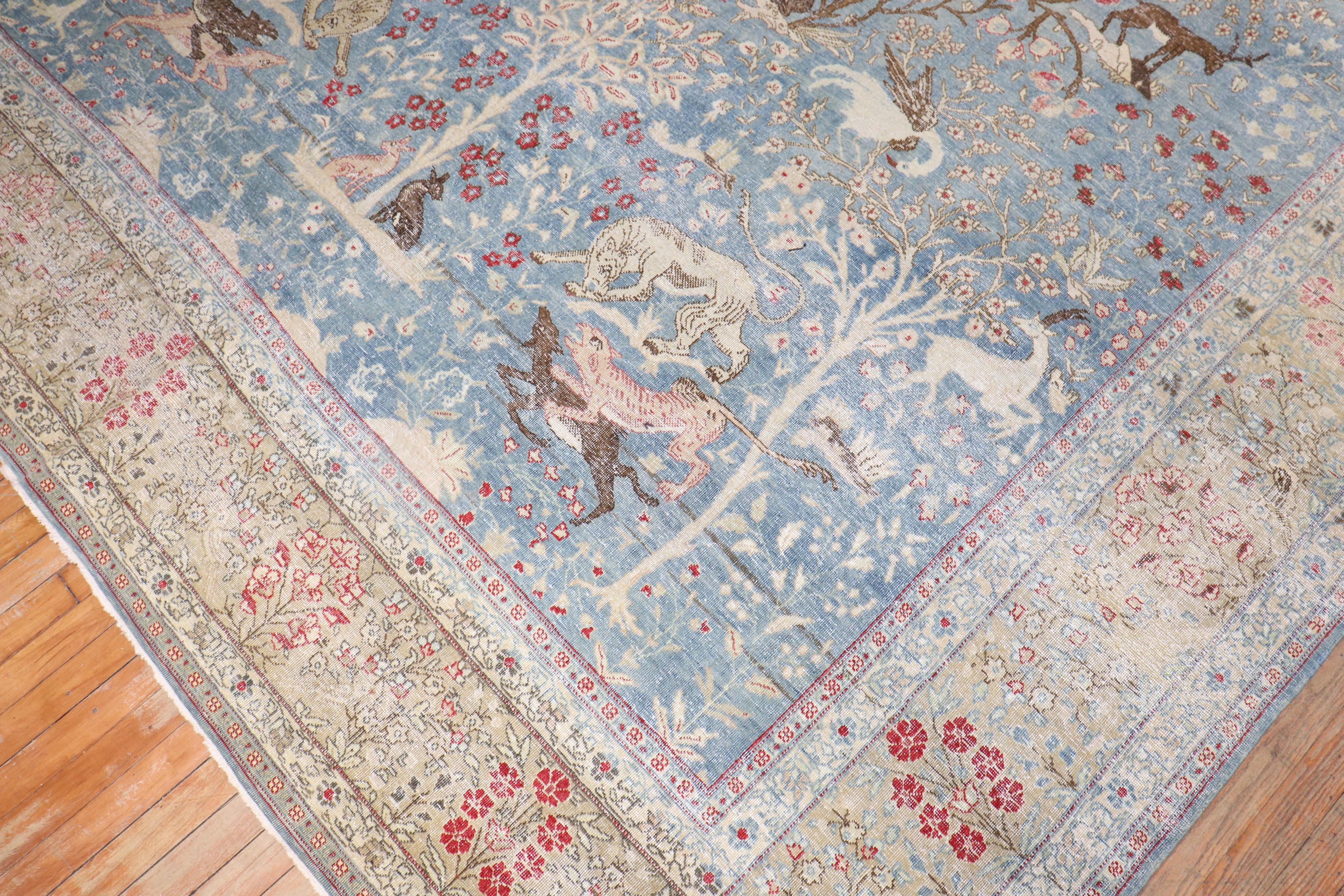 Large room-size antique Persian Tabriz rug featuring a formal Pictorial Animal Hunting Pattern from the 1st quarter of the 20th Century

Measures: 9'3'' x 13'5''