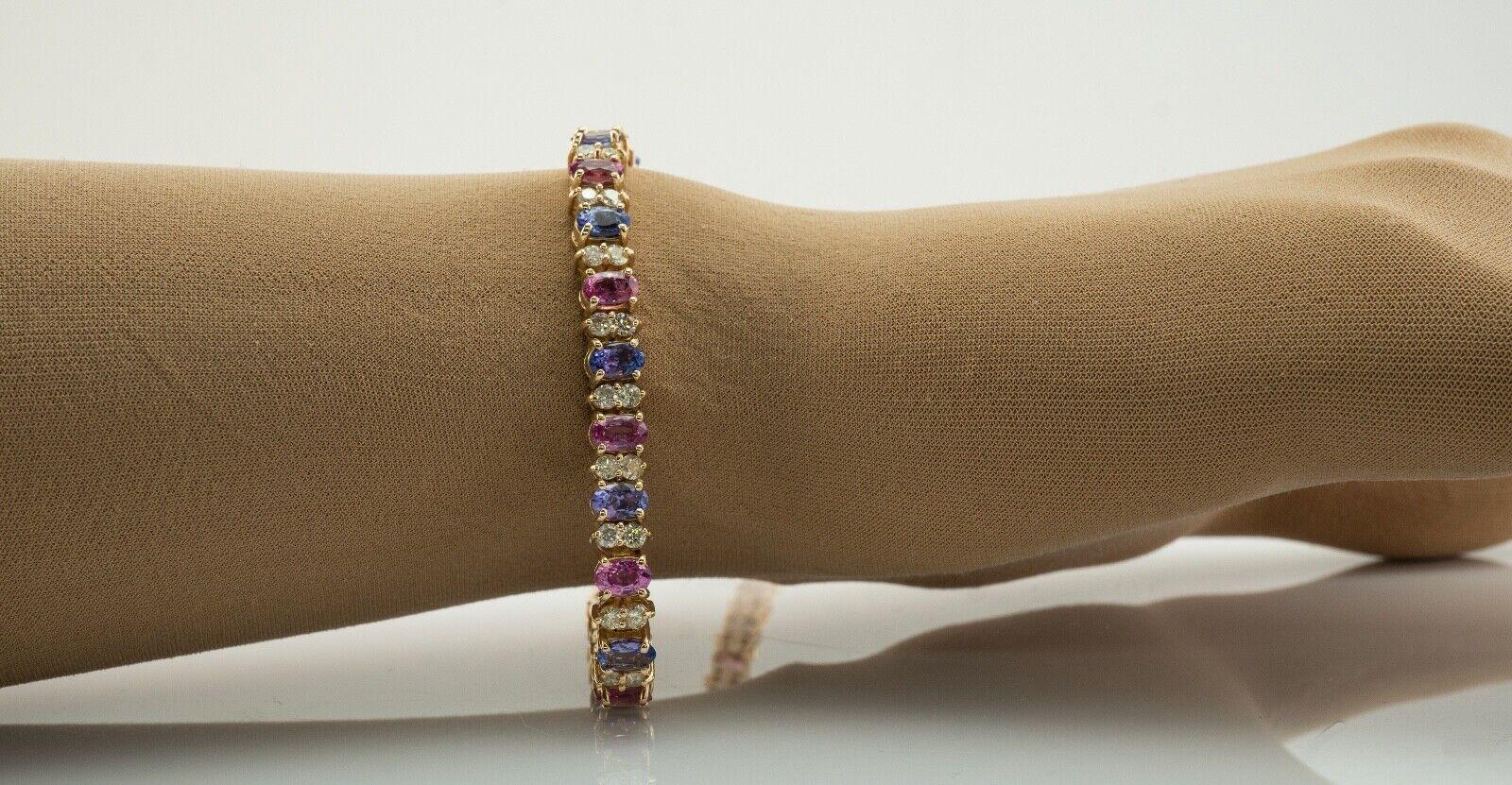 Armband aus 14 Karat Gold mit blauem, rosa Saphir und Diamant (Ovalschliff) im Angebot