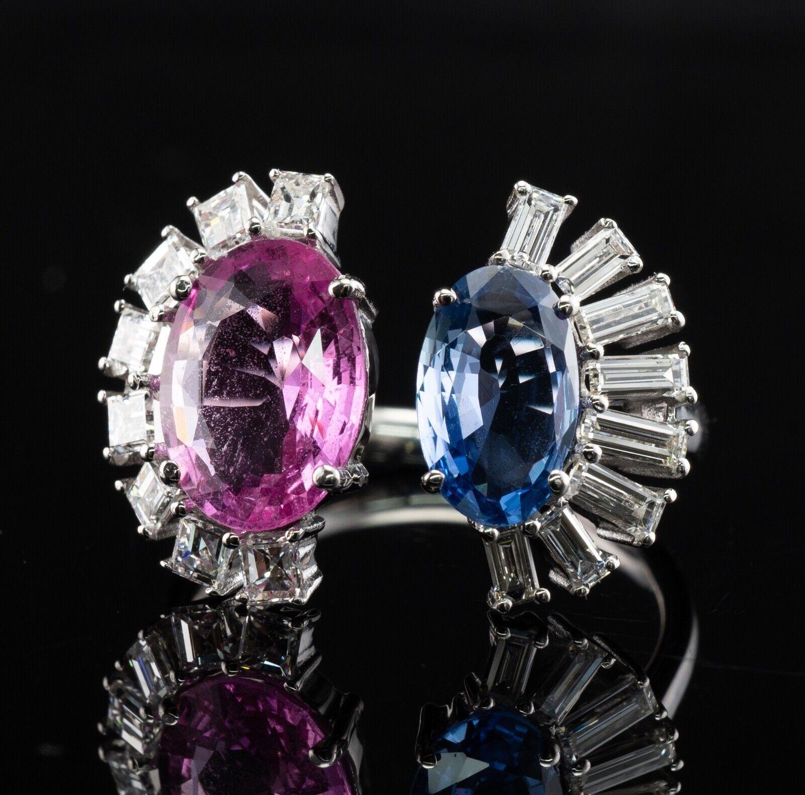 This unusual estate ring is finely crafted in solid 18K White Gold.
Natural Earth mined Pink Sapphire measures 10x8mm (3.15 carats).
Oval blue Sapphire measures 9x5mm (1.80 carats). 
8 square cut and 8 diamond baguettes total 1.24 carats of VS1-VS2