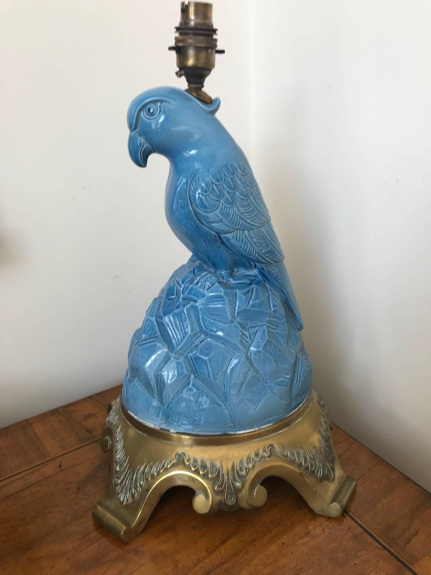 A stunning blue porcelain lamp in the form of parrot mounted on a solid cast bronze base, English, circa 1930s.