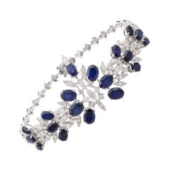 Pulsera ancha de oro blanco de 14 quilates con piedras preciosas procesadas de color azul y diamantes naturales