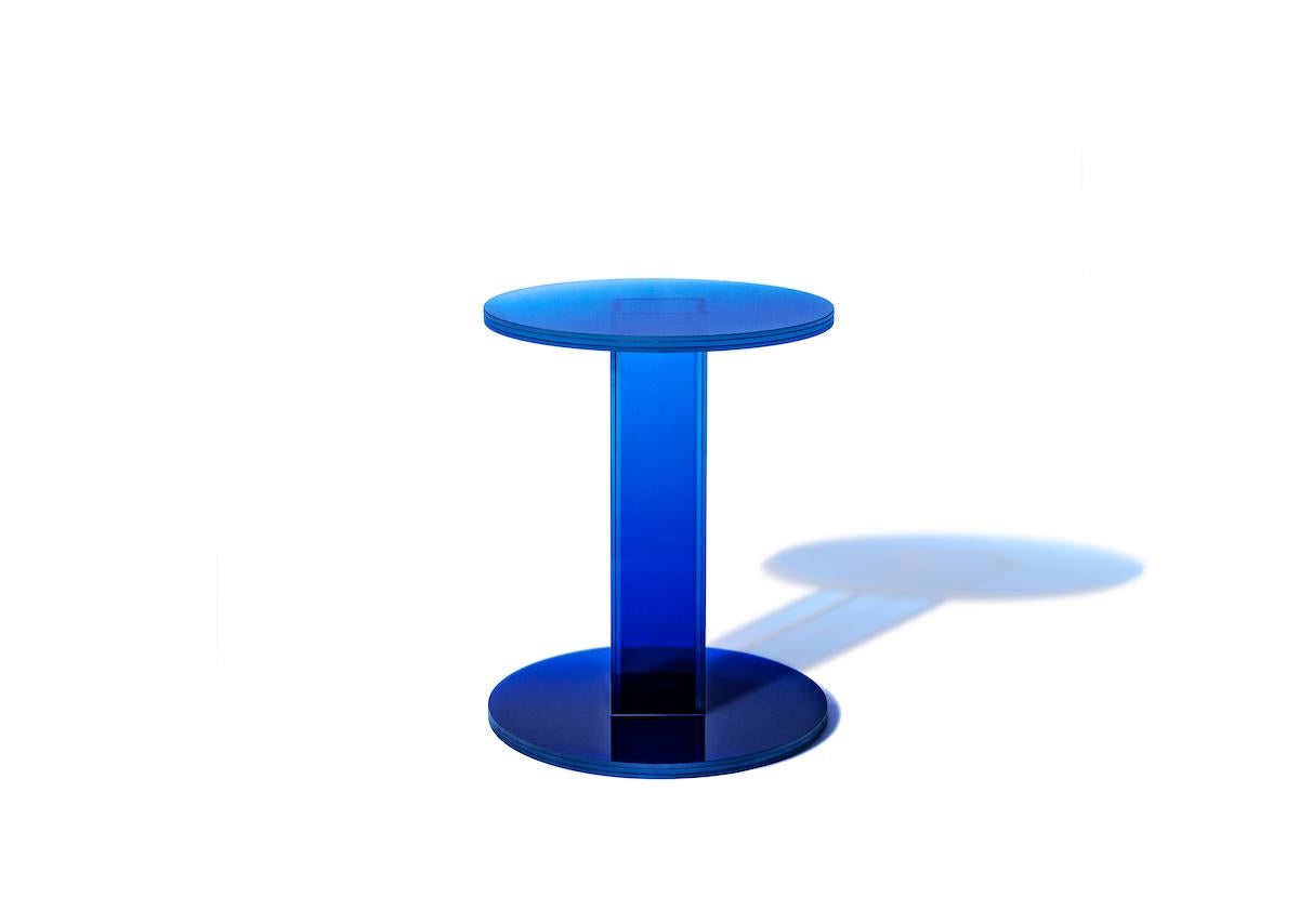 This side table is made with compound glass in blue and purple color. Size and color are customizable upon request. 

Studio Buzao is an experimental design studio. It tempts to breakthrough the difference between product and artwork by immersing