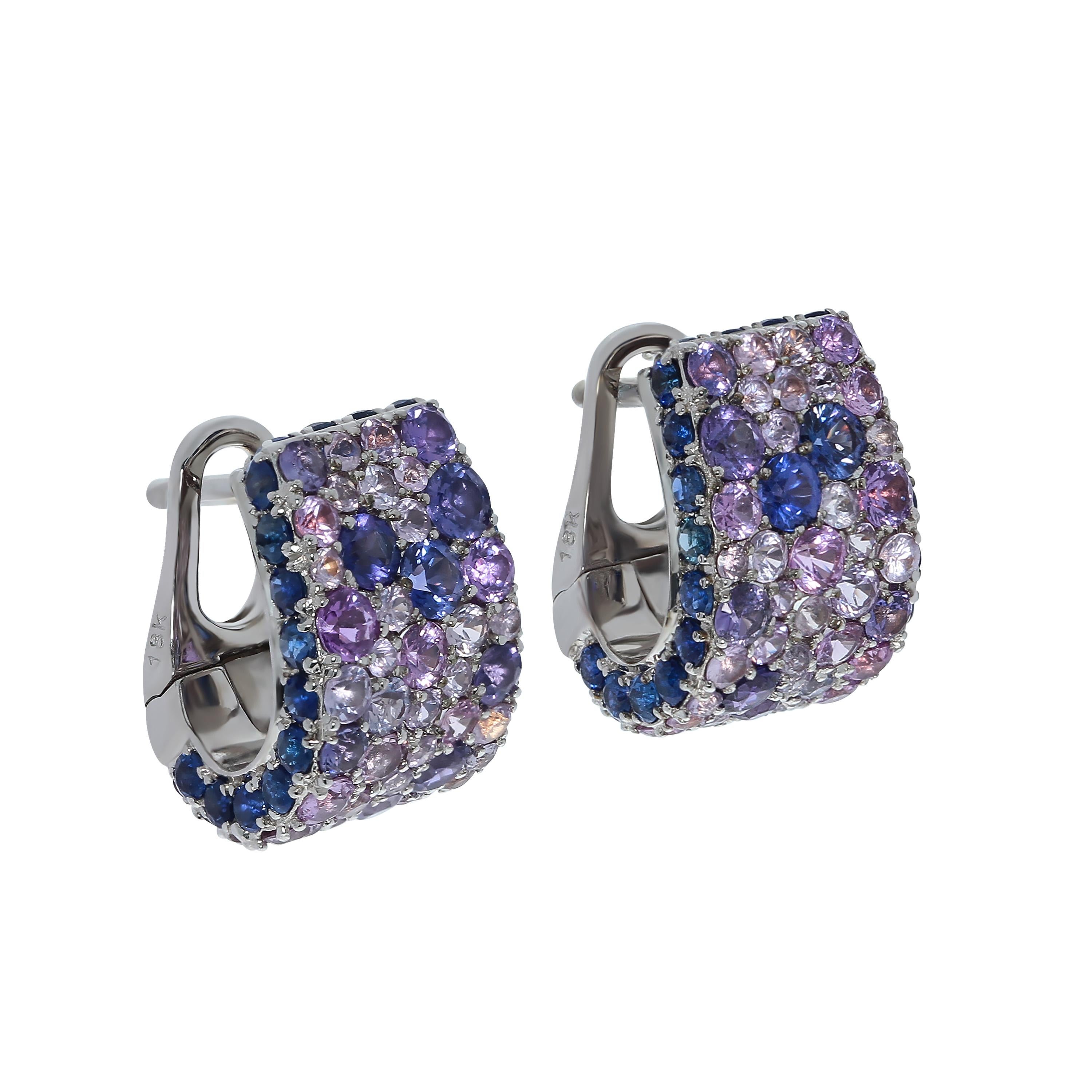 Blue Purple Sapphires 18 Karat White Gold Riviera Earrings
Imagine a warm summer evening, seashore, unobtrusive music, small talks, sparkling wine. It is at such cocktail parties that the jewelry from our Riviera Collection will be in the center of