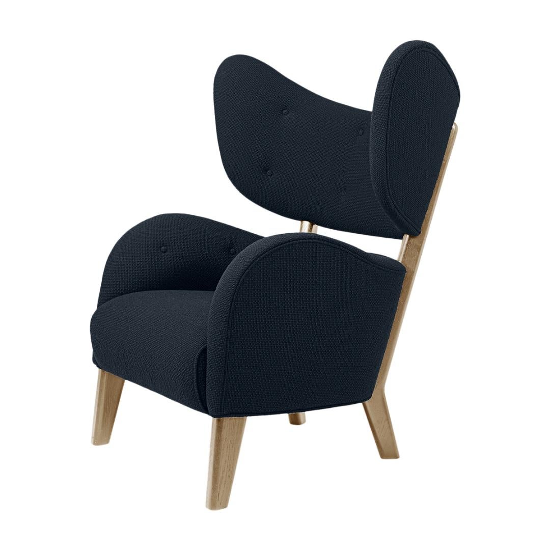 Blue Raf Simons Vidar 3 natural oak my own chair lounge chair by Lassen
Dimensions: W 88 x D 83 x H 102 cm 
Materials: Textile

Flemming Lassen's iconic armchair from 1938 was originally only made in a single edition. First, the then