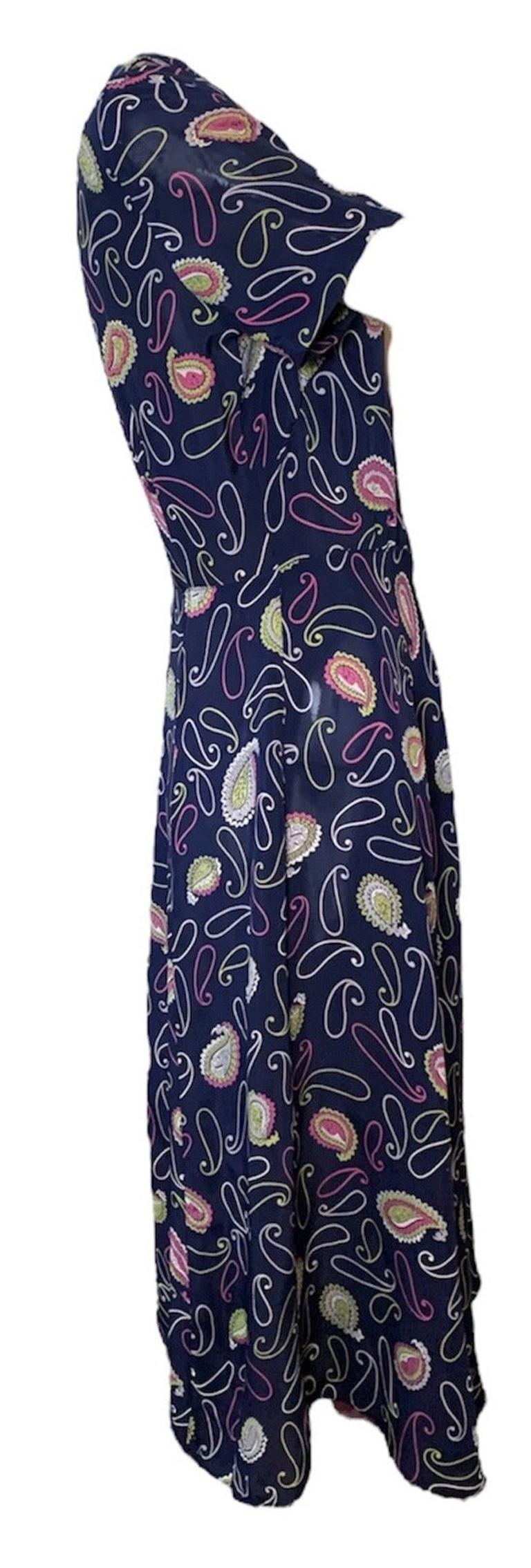 Sweet and colorful 1940s era dress in royal blue rayon with whimsical oversized paisley print. You know- that wonderfully weighted 1940’s kind of rayon that moves so beautifully in bold colors with scoop neck and flared skirt. .  Excellent