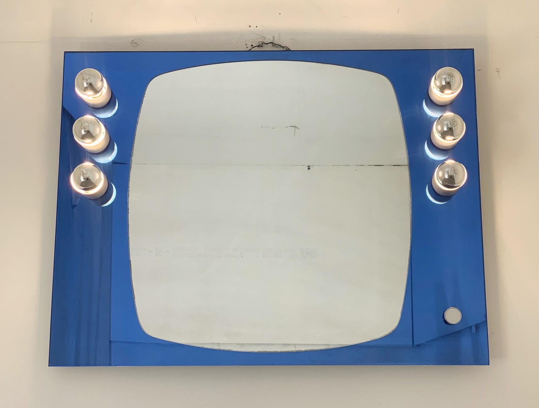 Vintage Italian rectangular mirror with blue beveled glass, illuminated with 6 lights including a light dimmer / Made in Italy by Veca, circa 1960s
Original 