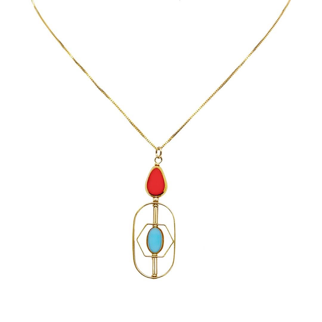The necklace is composed of German Vintage Glass Beads that are edged with 24K gold. It is incorporated with oval freshwater pearls set in a geometric frame. The chain is 18 inch gold-filled

The vintage glass beads that is framed with 24K gold were