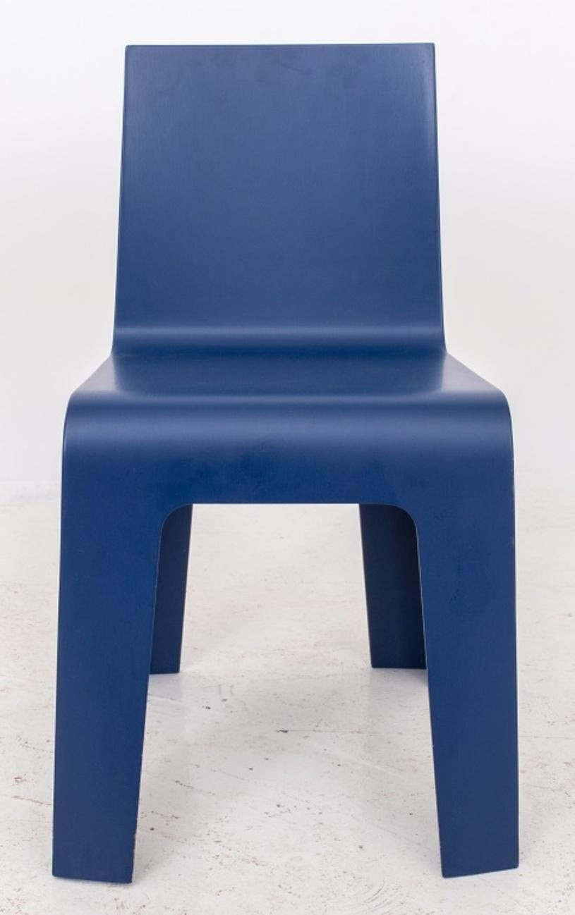 Blue resin childrens' chair, of typical form with circular cut-outs to rear. 21.5