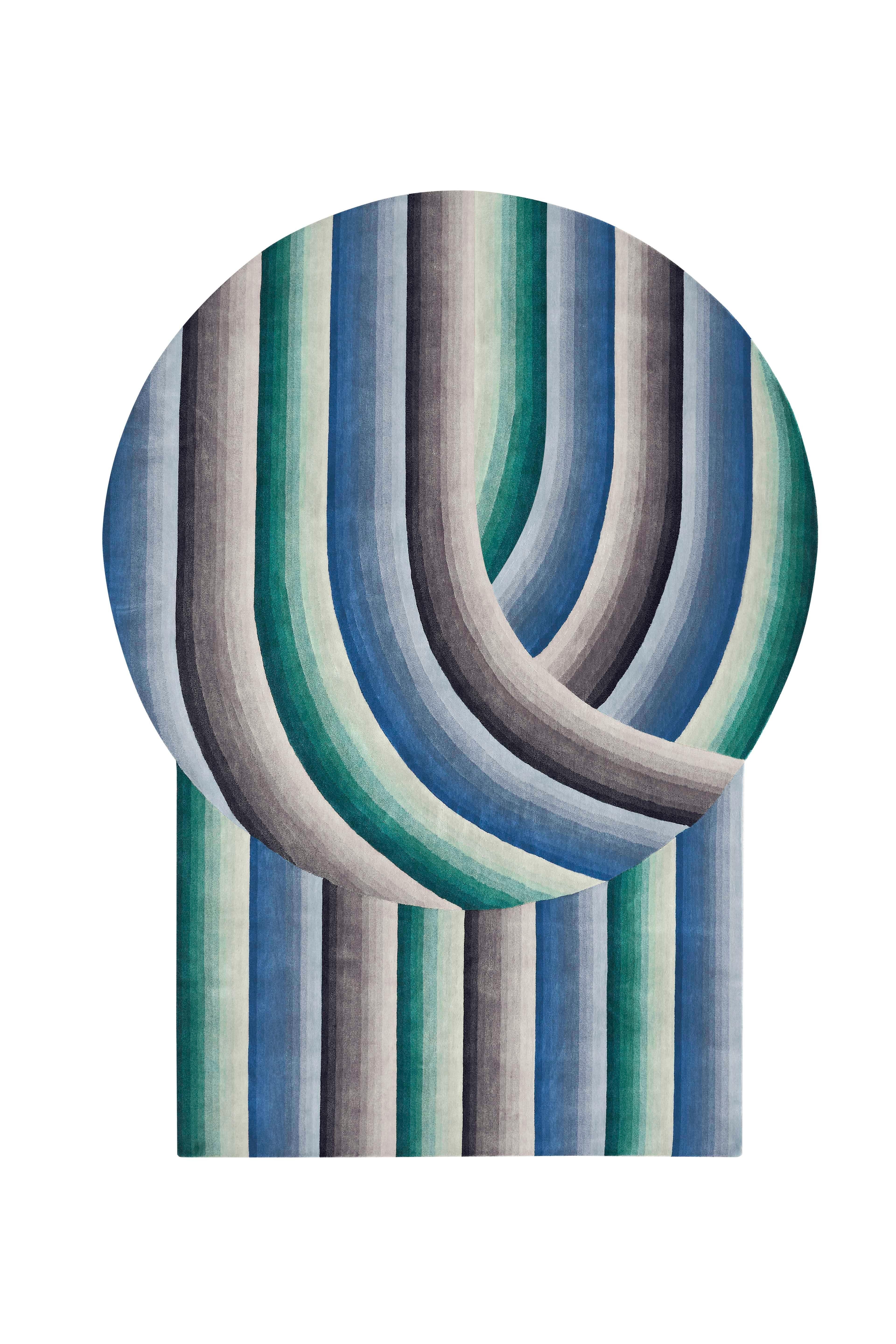 Blue Round Mirage Rug by Gandia Blasco
Design by Patricia Urquiola
Dimensions: W 210 x H 300 cm. 
Materials: Fiber composition: 100% wool. 
Weight: 20,2 kg

Passion for life outdoors, a dream come true on the edge of a cliff in the north of Ibiza.